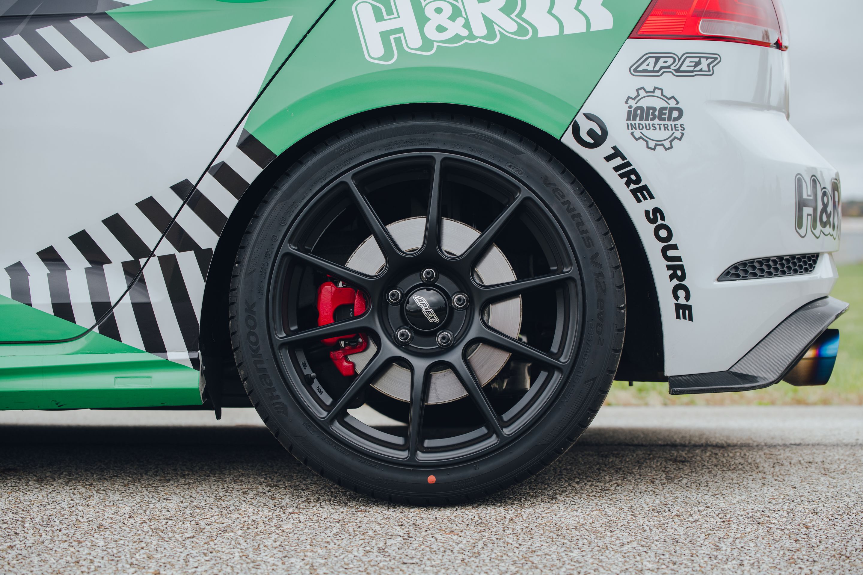 Race Livery VW MK7 GTI with 18" SM-10 Apex wheels in Satin Black