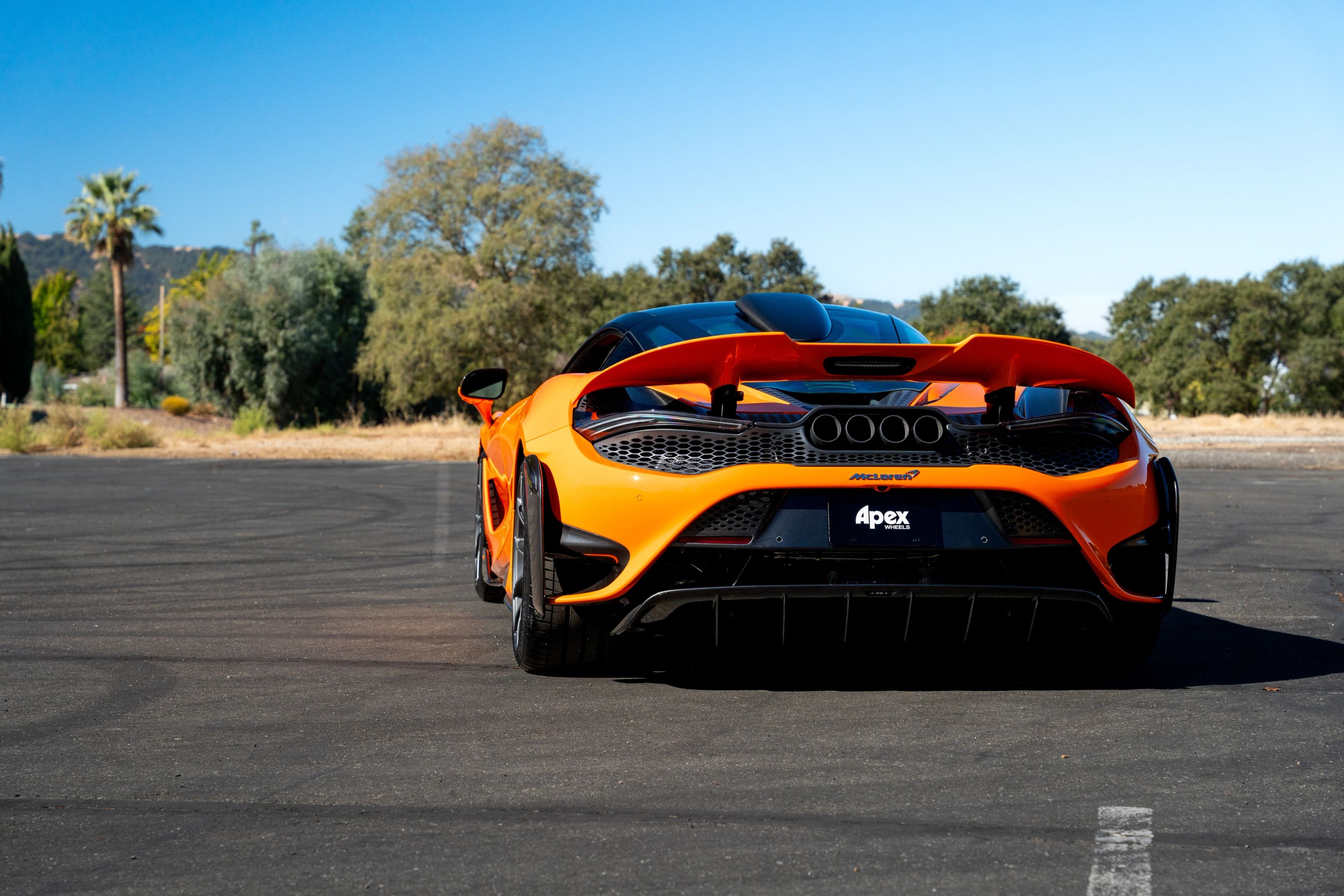 Orange McLaren 765LT with 19"/20" VS-5RS Apex wheels in Anthracite