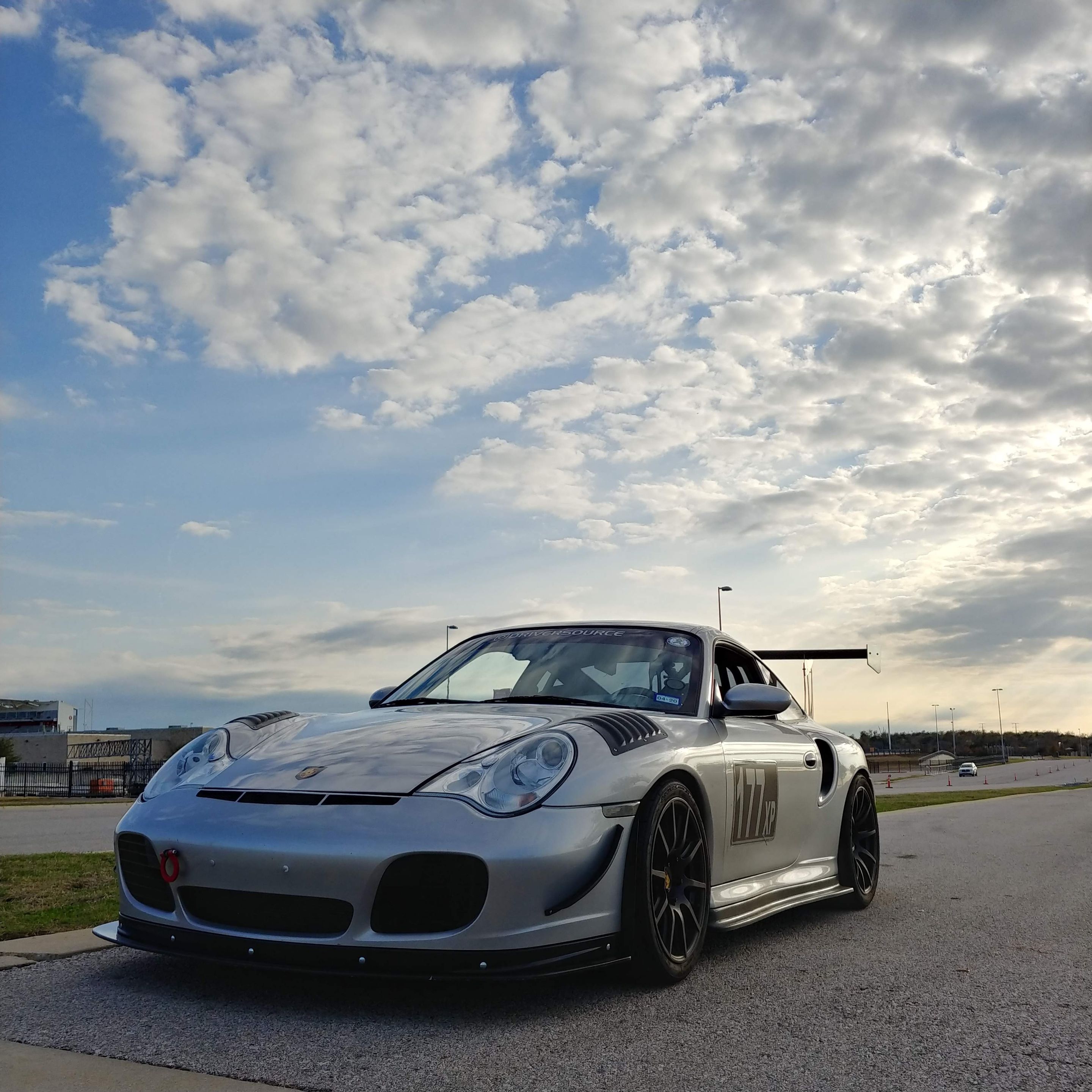 Silver Porsche 911 996 Turbo with 18" SM-10 Apex wheels in Satin Black