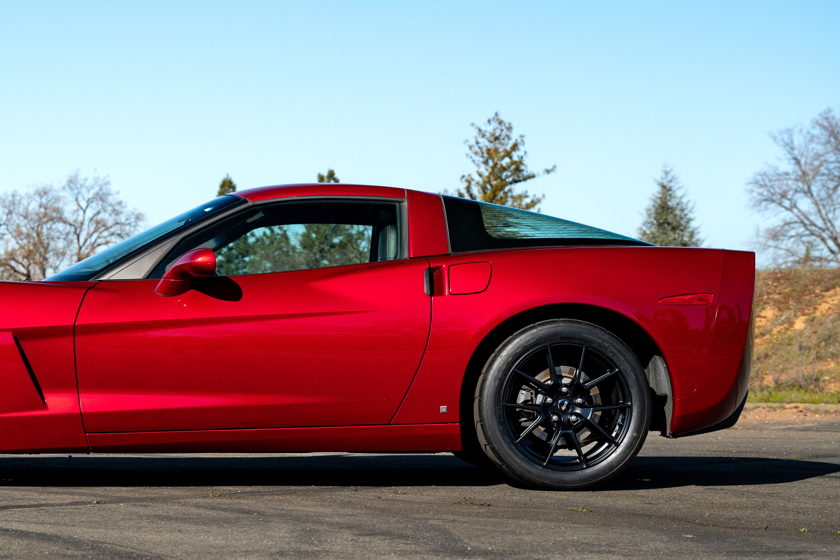 Red Chevrolet C6 Corvette Base/Z51 with 18" VS-5 Apex wheels in Satin Black