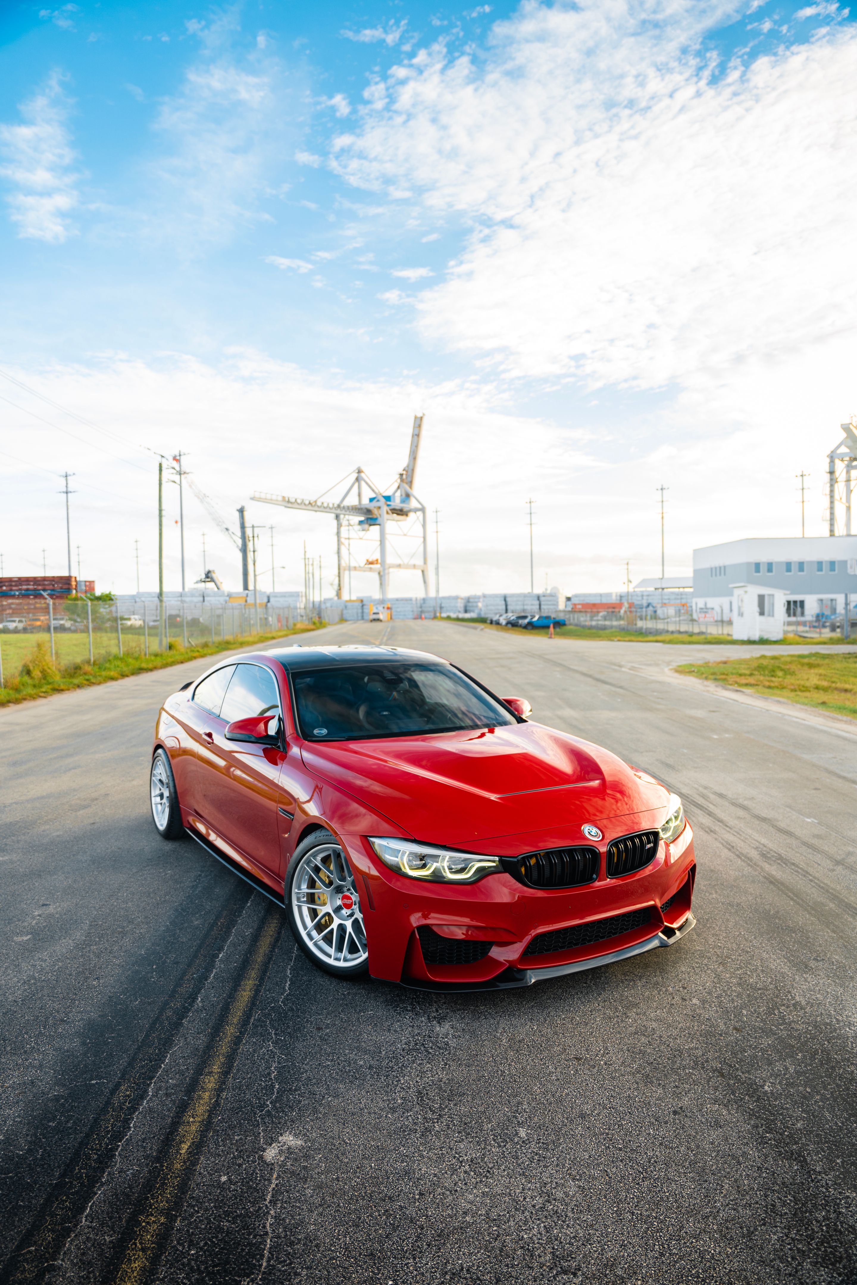 Red BMW F82 Coupe M4 with 19" ARC-8 Apex wheels in Hyper Silver
