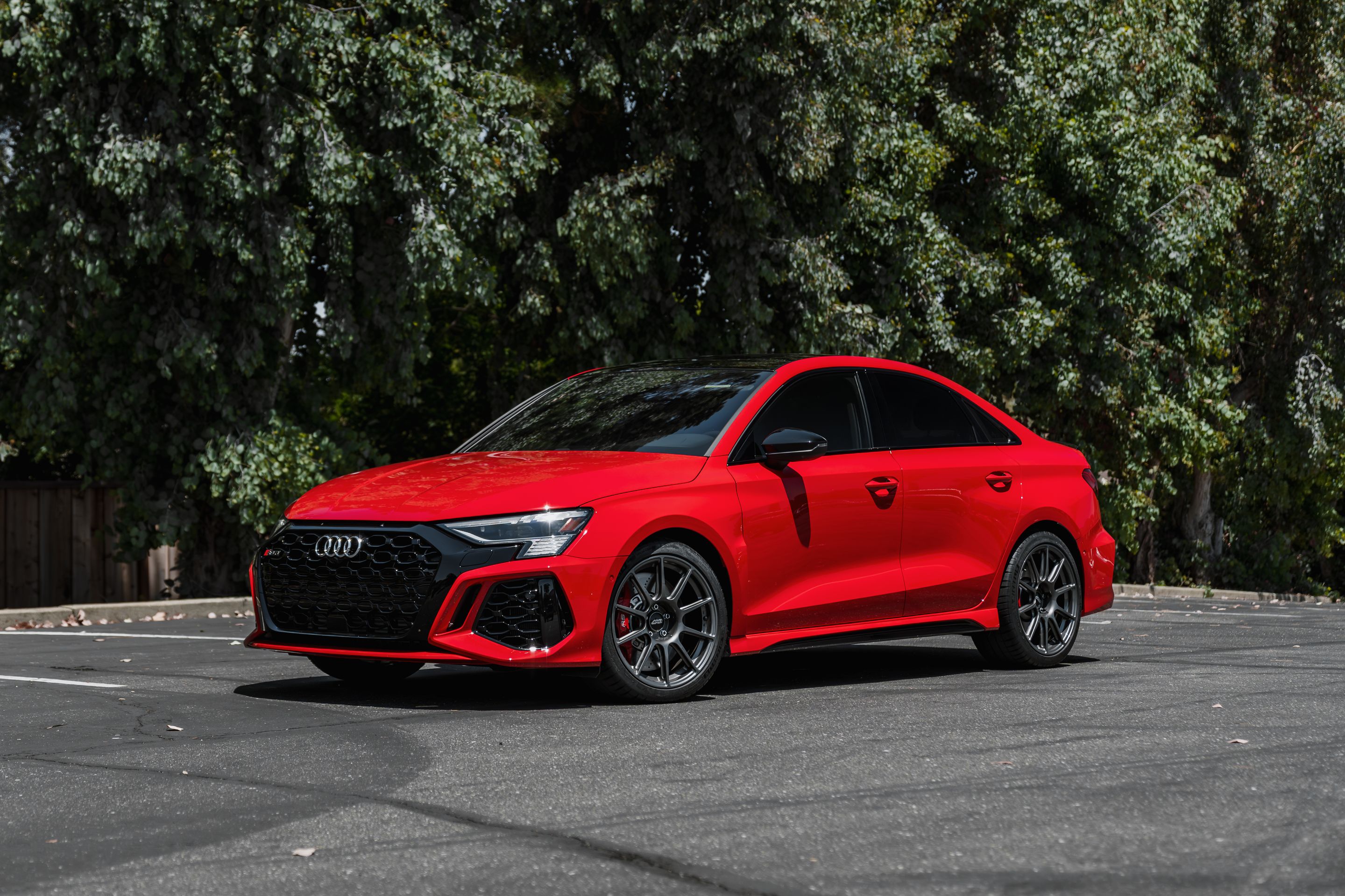Red Audi 8Y RS 3 with 18" SM-10 Apex wheels in Anthracite