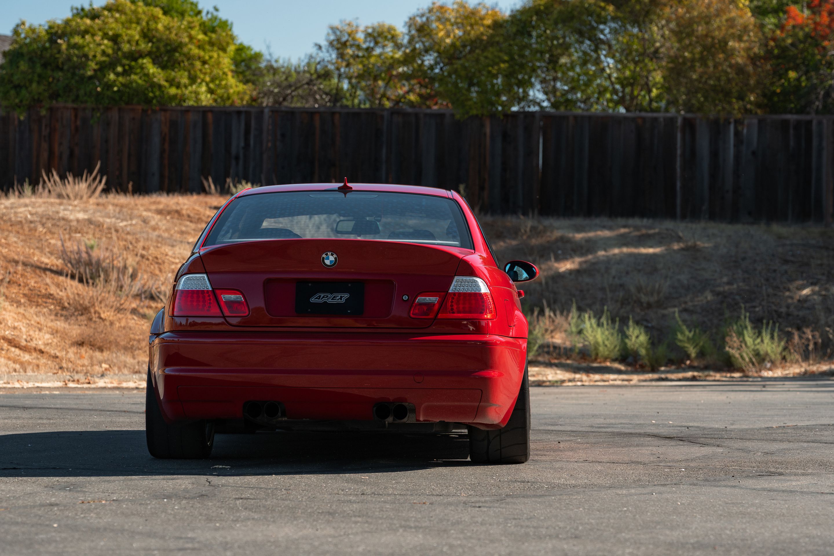 Red BMW E46 M3 with 18" SM-10RS Apex wheels in Anthracite