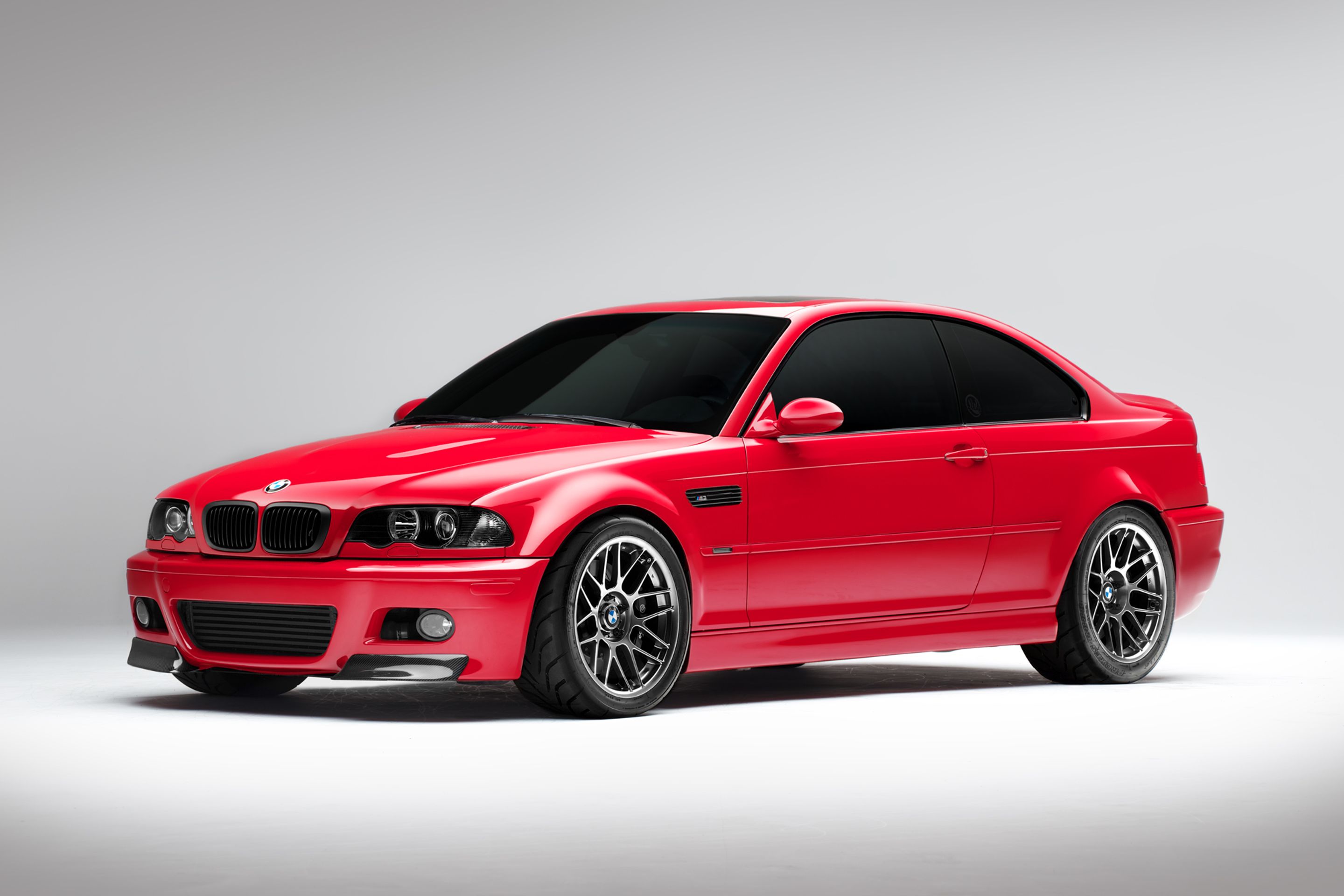 Red BMW E46 M3 with 18" ARC-8 Apex wheels in Hyper Black