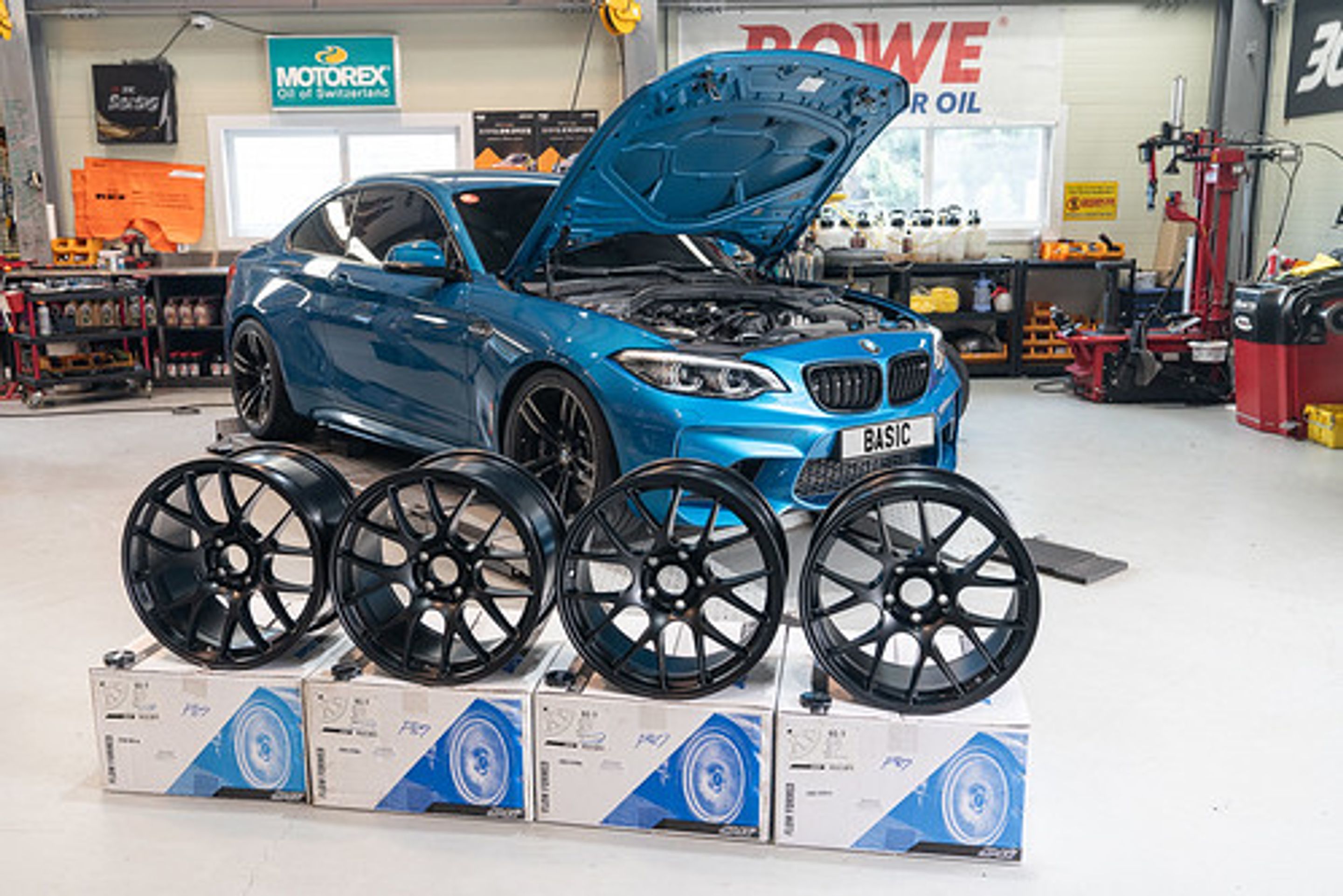 Blue BMW F87 M2 with 18" EC-7 Apex wheels in Satin Black