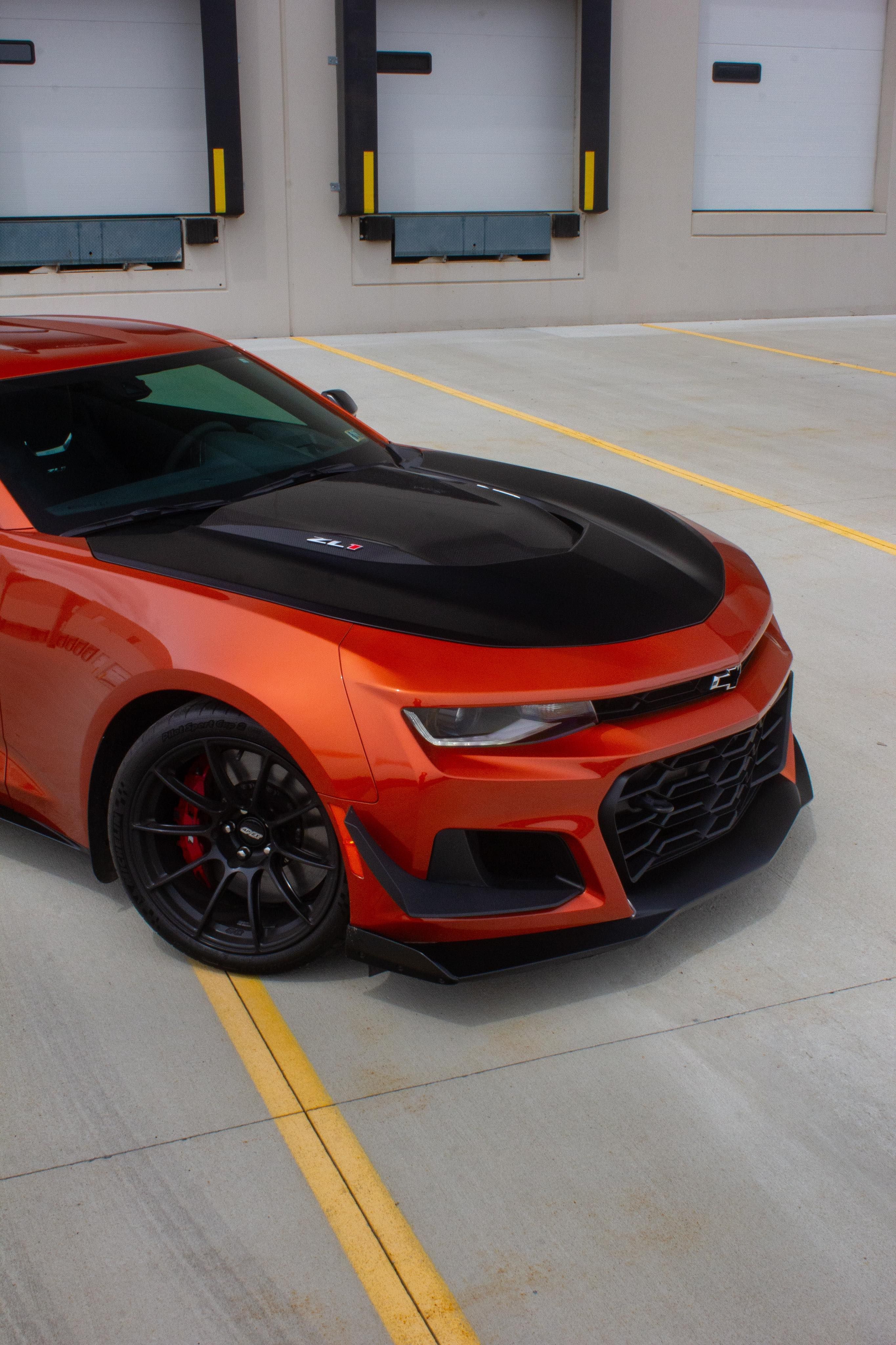 Red Chevrolet 6th Gen Camaro ZL1 1LE with 19" SM-10RS Apex wheels in Satin Black