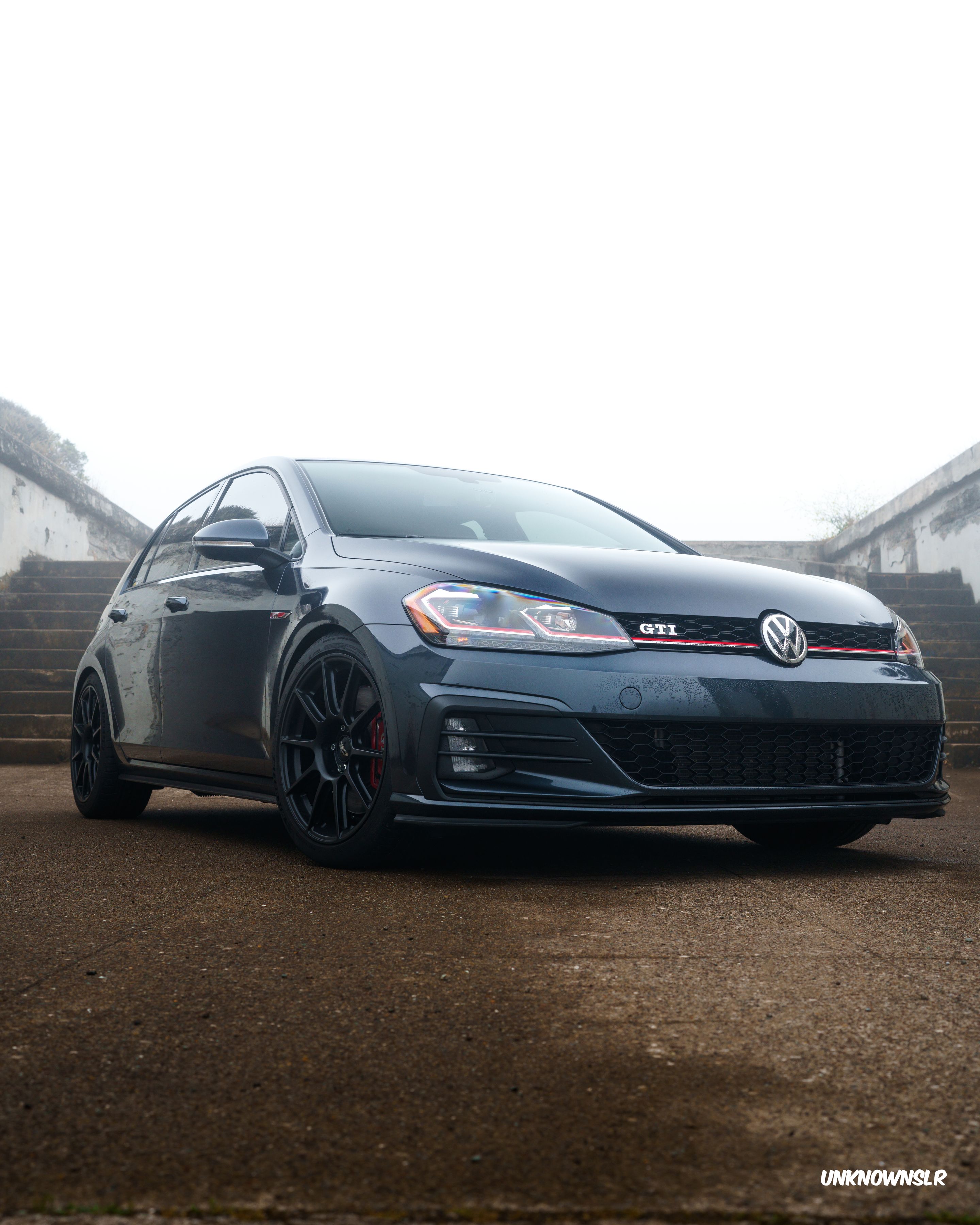 Blue VW MK7 GTI with 18" SM-10 Apex wheels in Satin Black