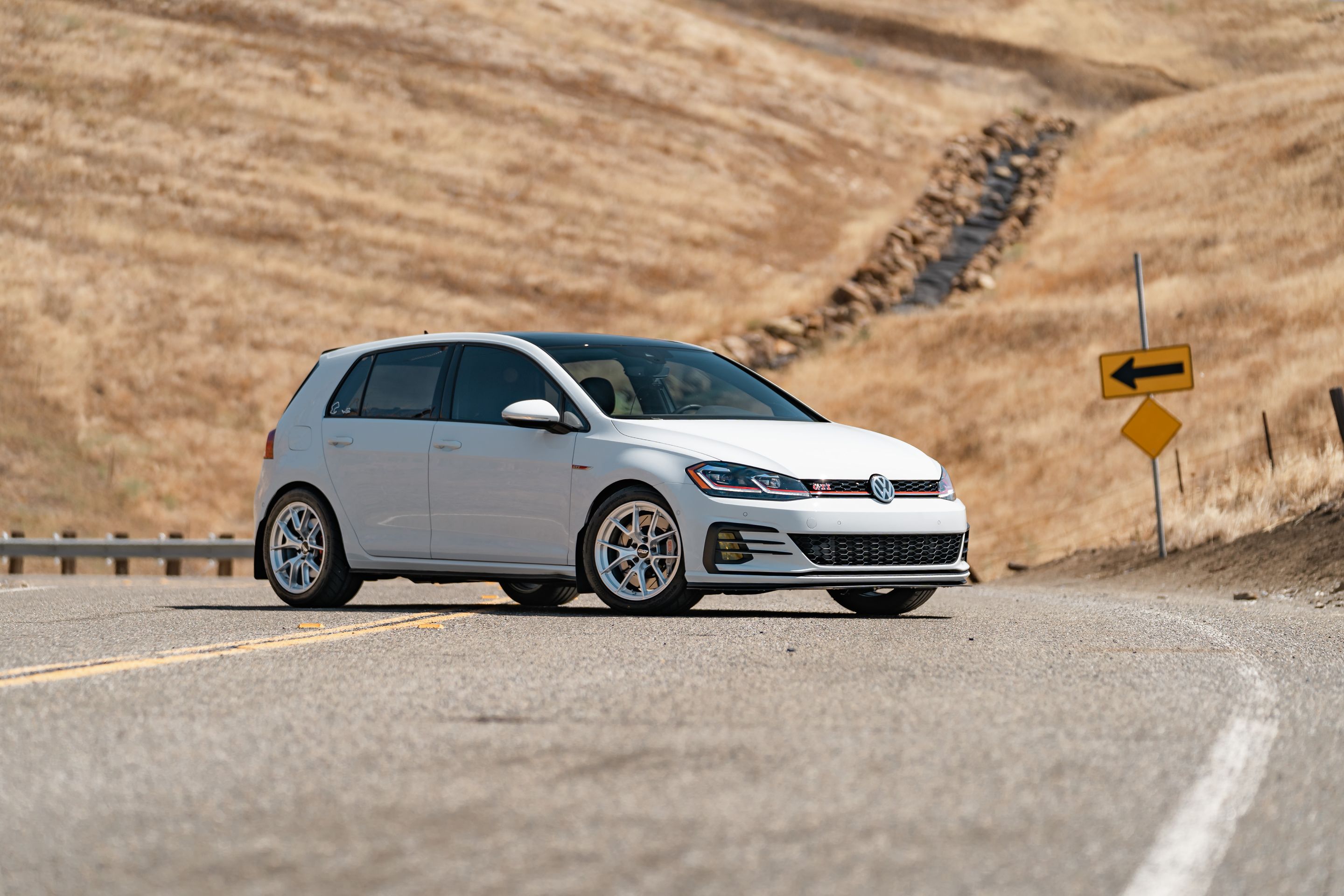 White VW MK7 GTI with 17" VS-5RS Apex wheels in Brushed Clear