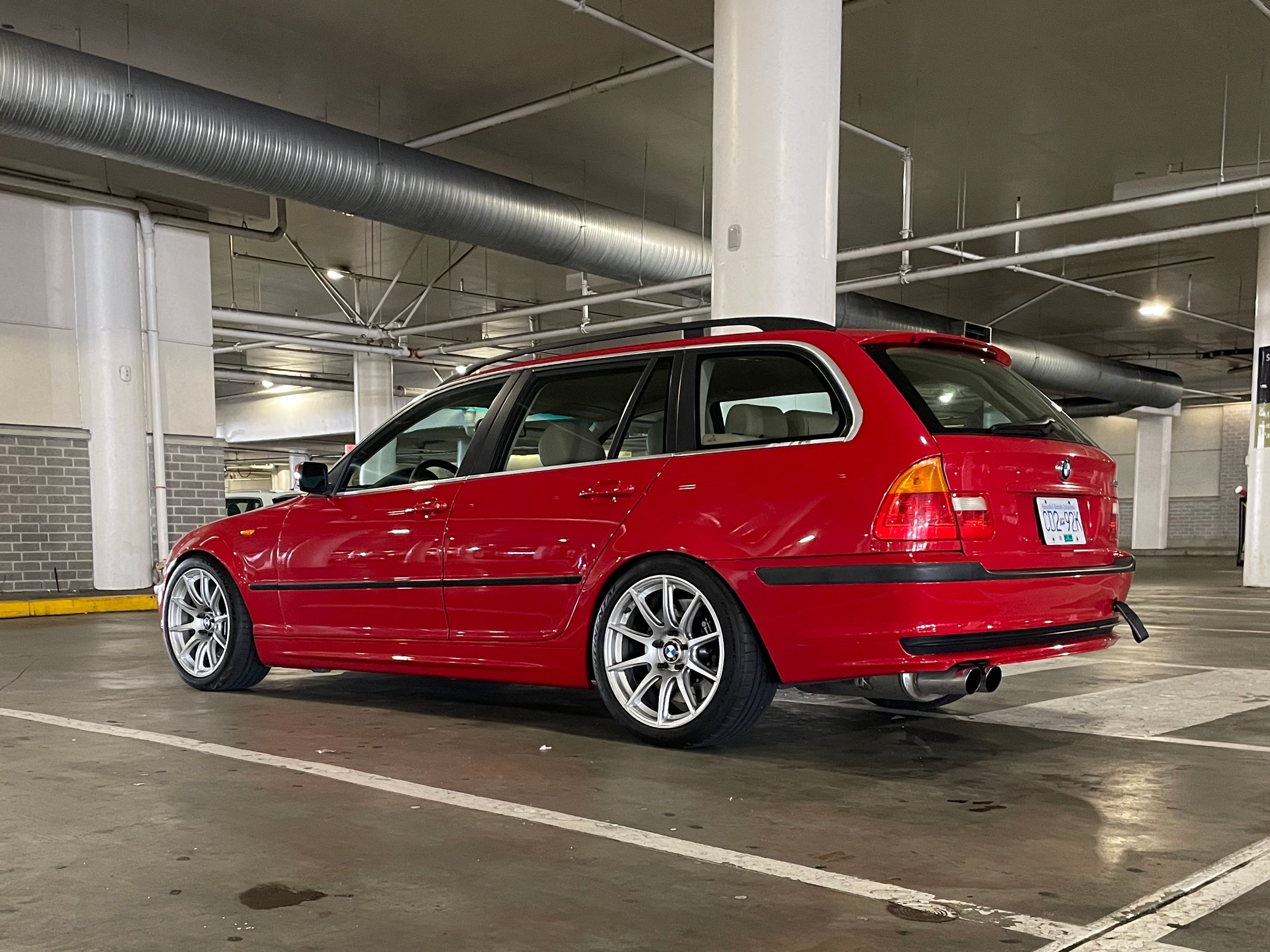 Red BMW E46 3 Series with 18" SM-10 Apex wheels in Race Silver