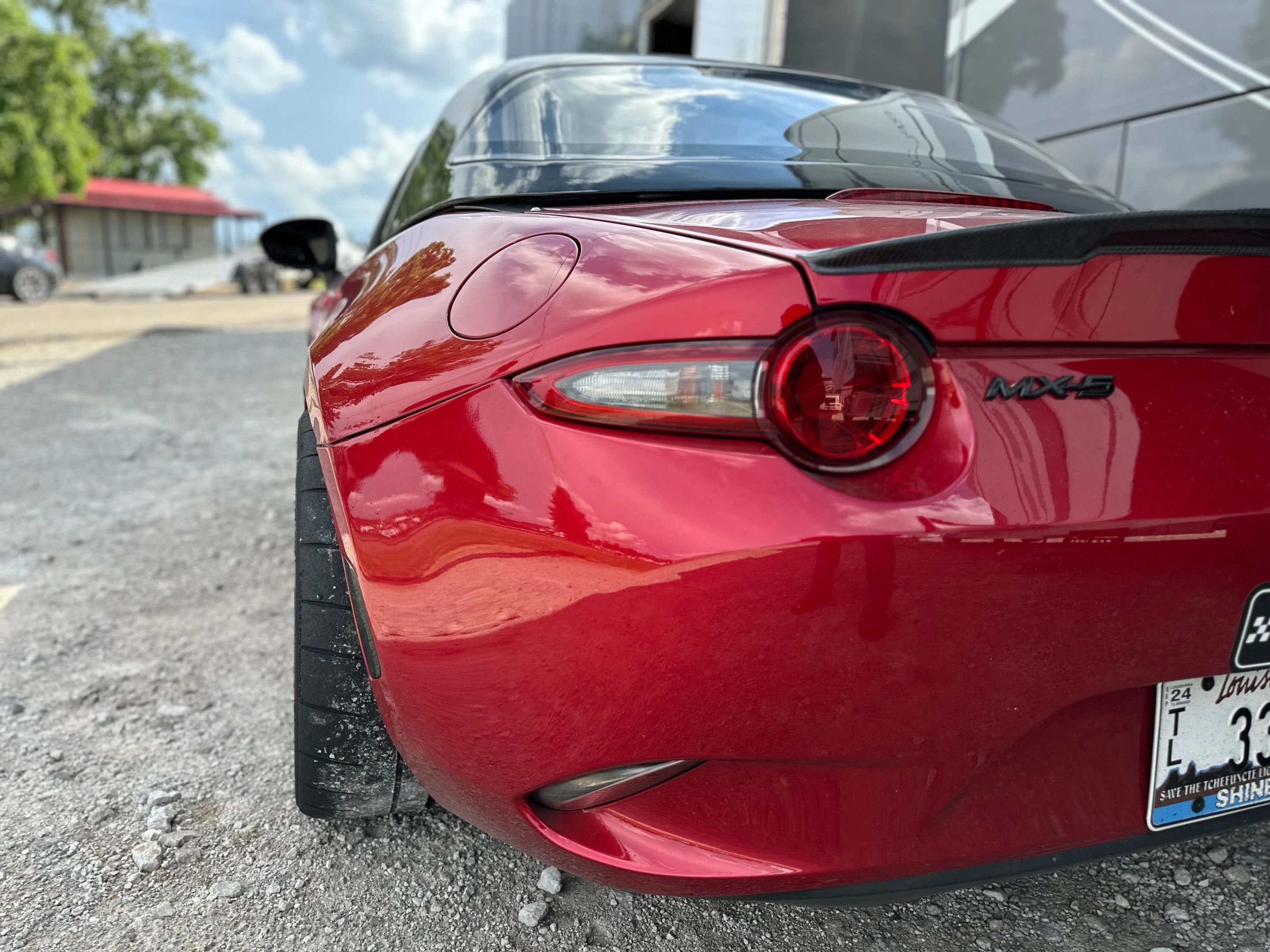 Red Mazda ND MX-5 Miata with 17" SM-8RS Apex wheels in Satin Bronze