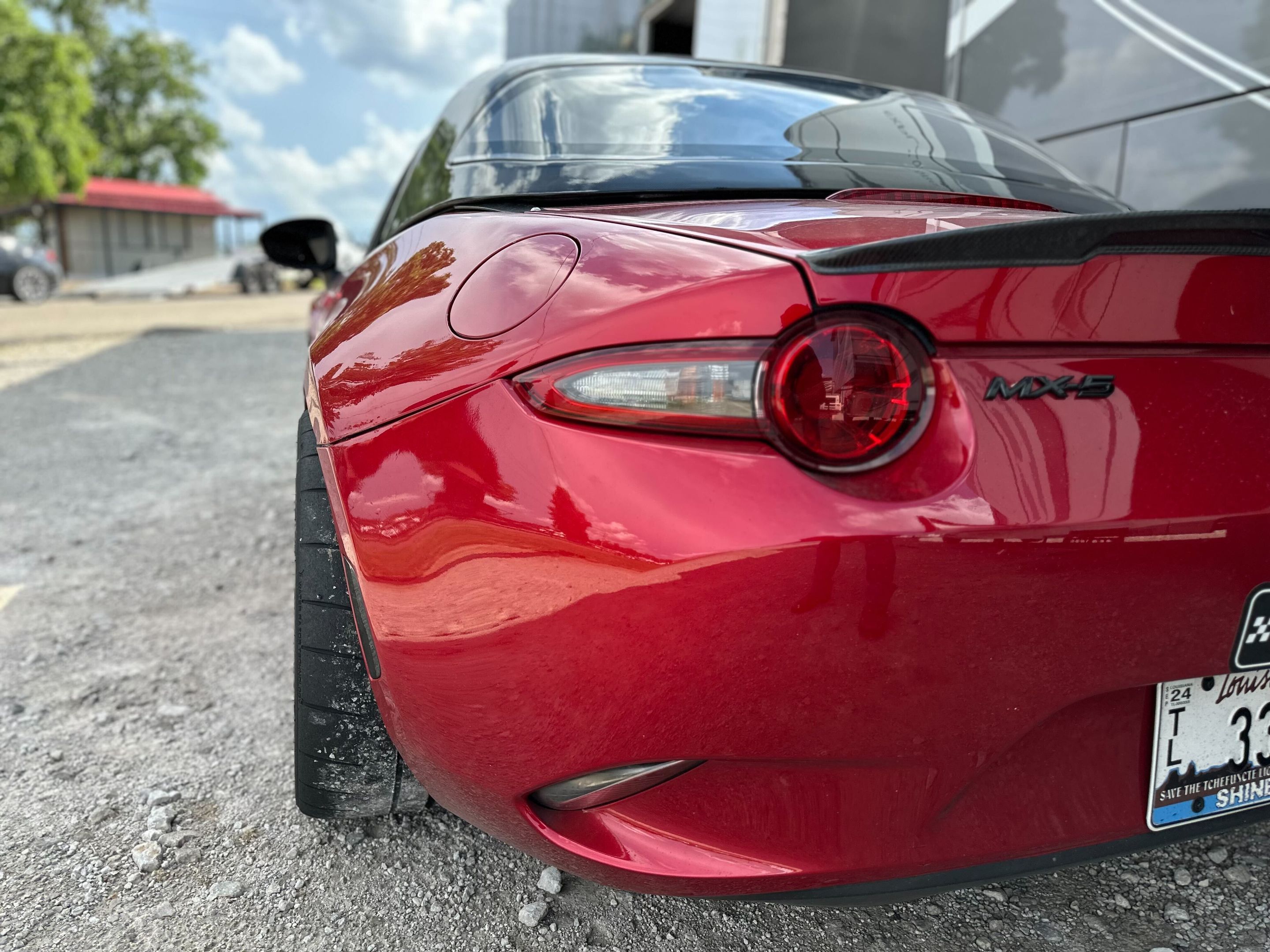 Red Mazda ND MX-5 Miata with 17" SM-8RS Apex wheels in Satin Bronze