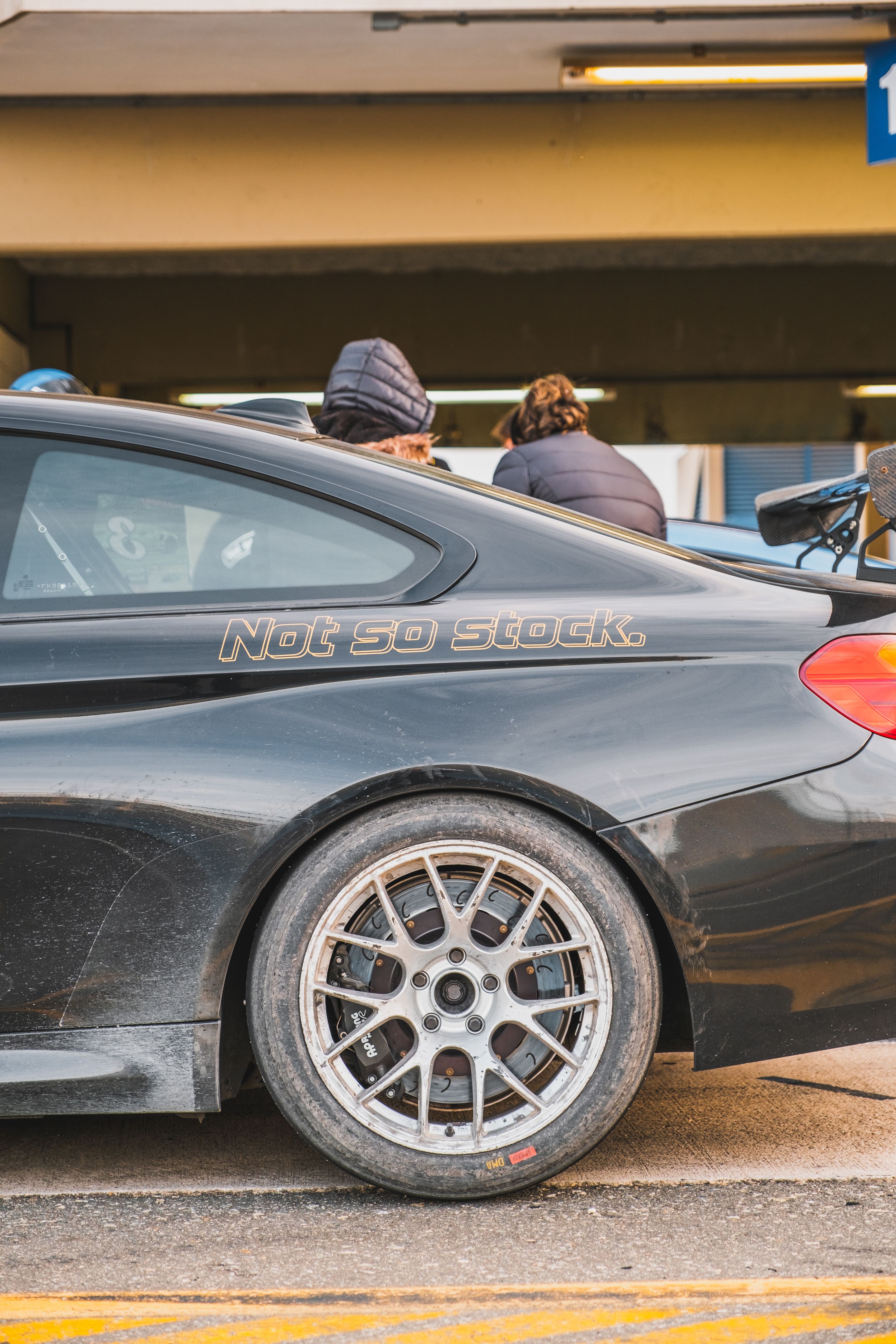 Black BMW F82 Coupe M4 with 18" EC-7 Apex wheels in Race Silver