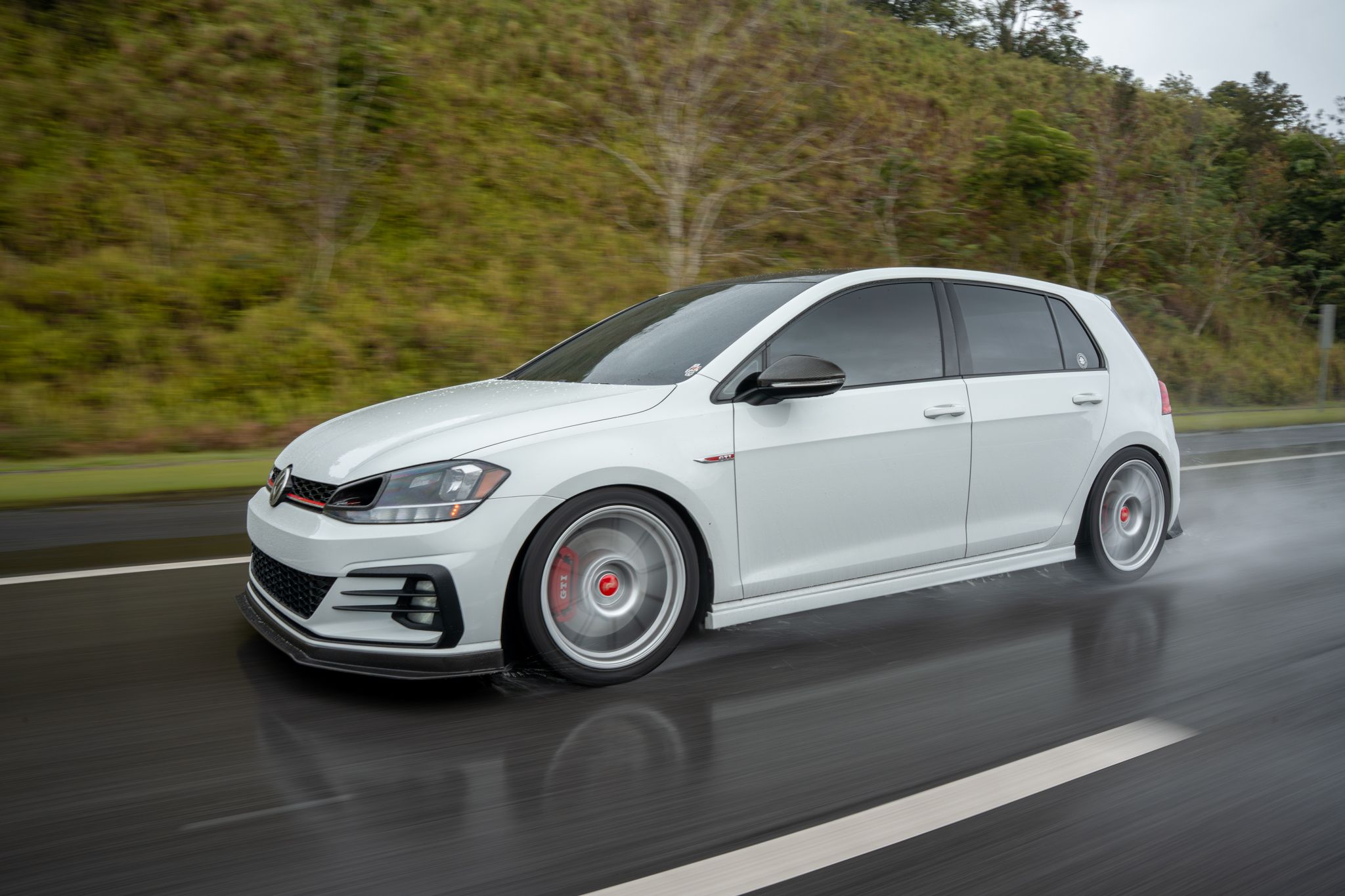 White VW MK7 GTI with 18" SM-10 Apex wheels in Race Silver