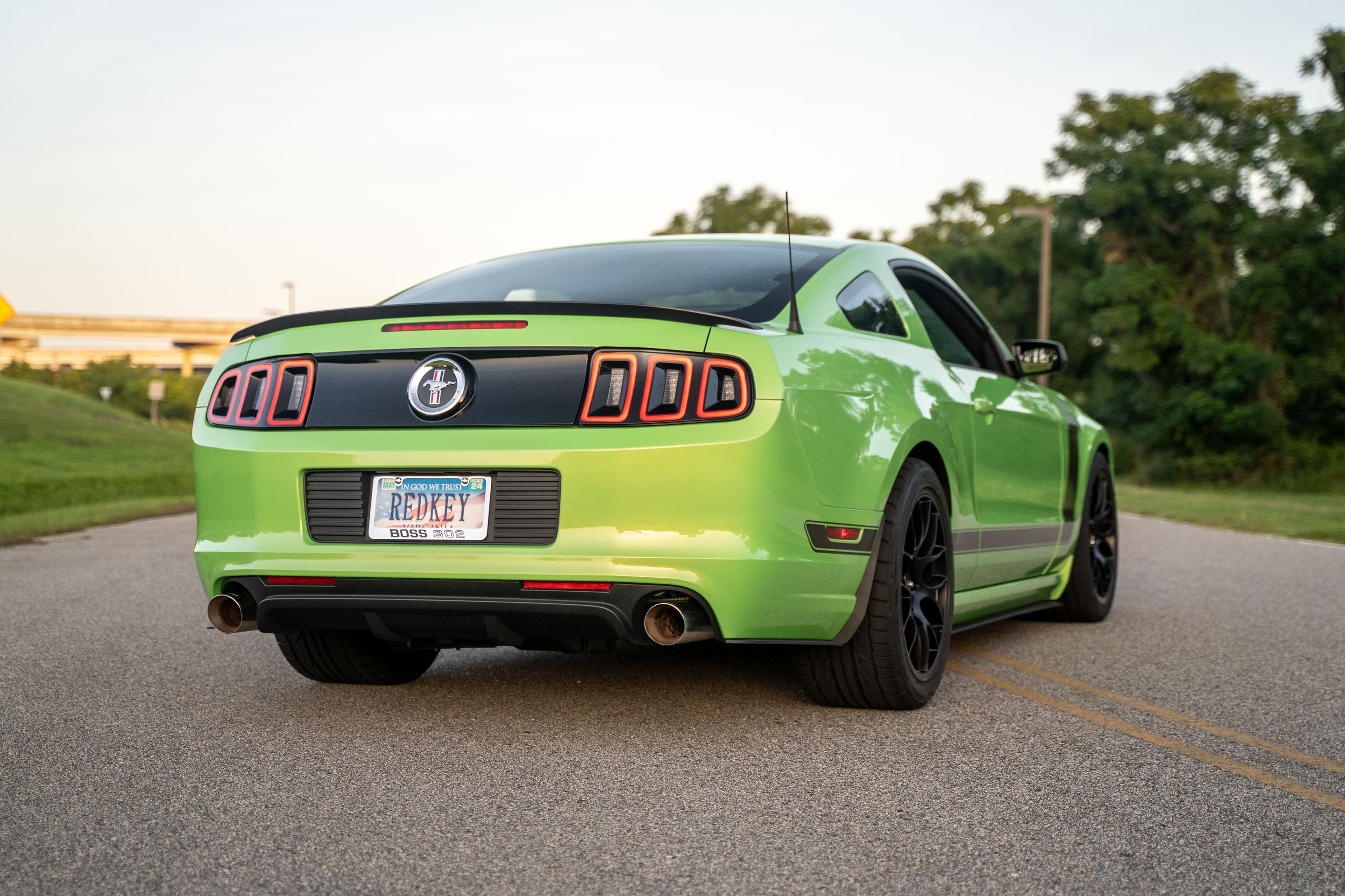 Green Ford S197 Mustang Boss 302 with 19" EC-7 Apex wheels in Satin Black
