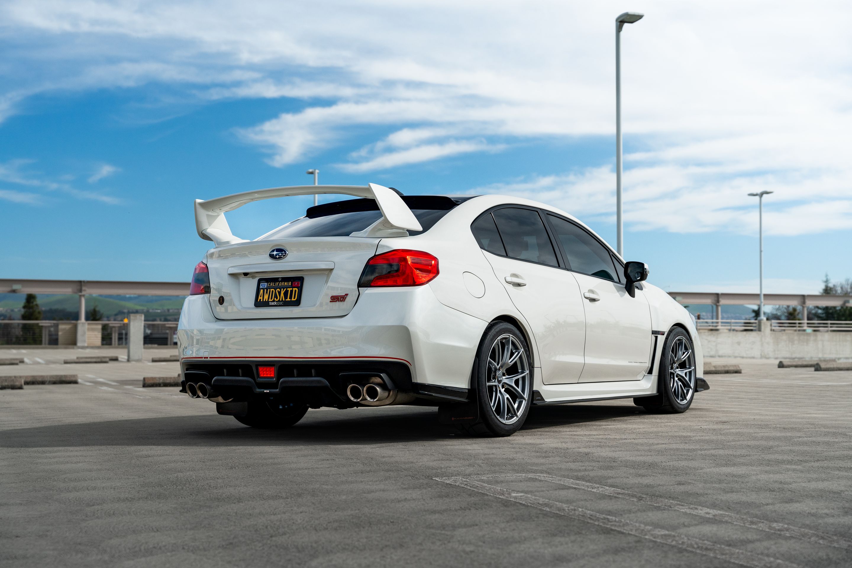 White Subaru VA WRX STI with 18" VS-5 Apex wheels in Hyper Black