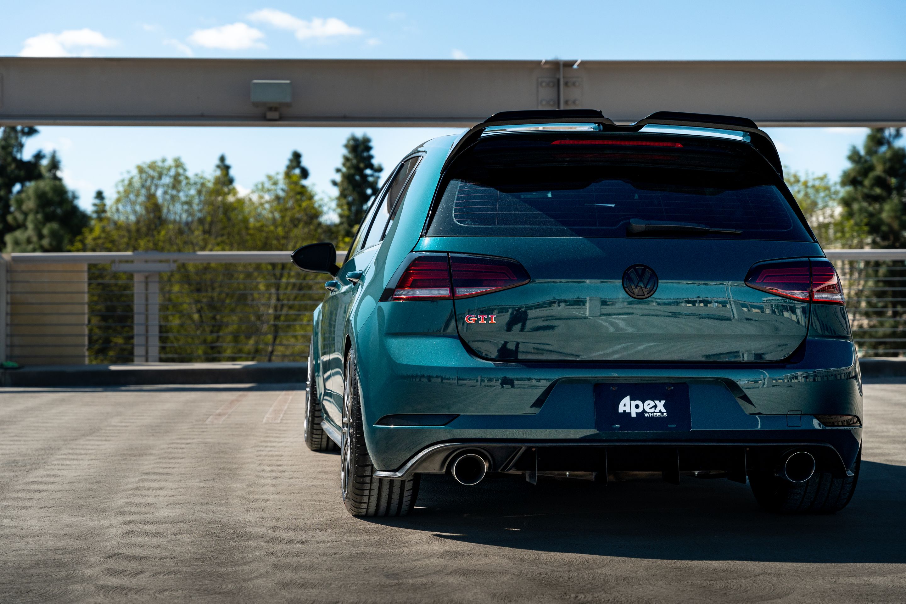 Green VW MK7 GTI with 18" TC-10RT Apex wheels in Anthracite