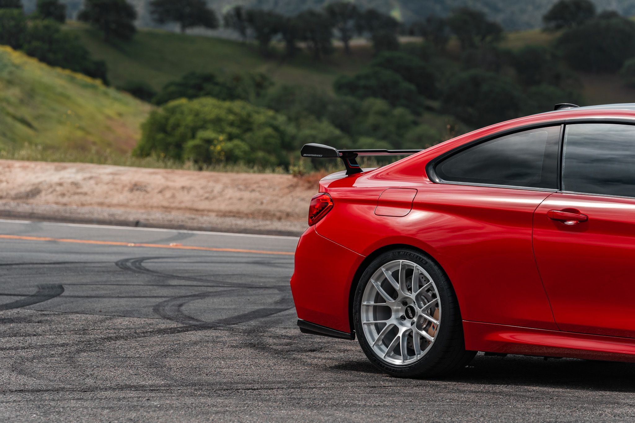 Red BMW F82 Coupe M4 with 19" EC-7RS Apex wheels in Brushed Clear
