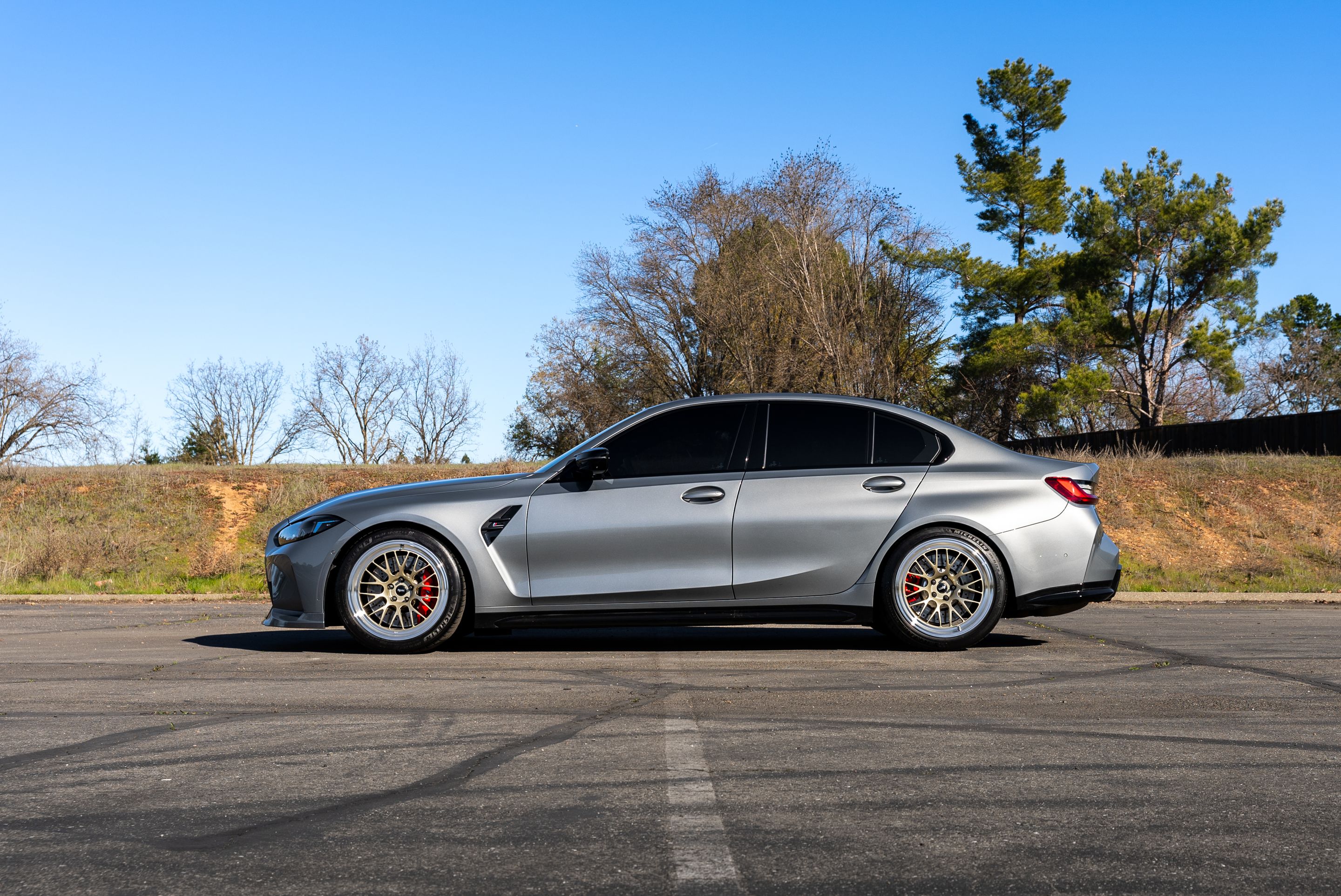 Grey BMW G80 M3 with 19" ML-10RT Apex wheels in Machined Lip Gloss Motorsport Gold