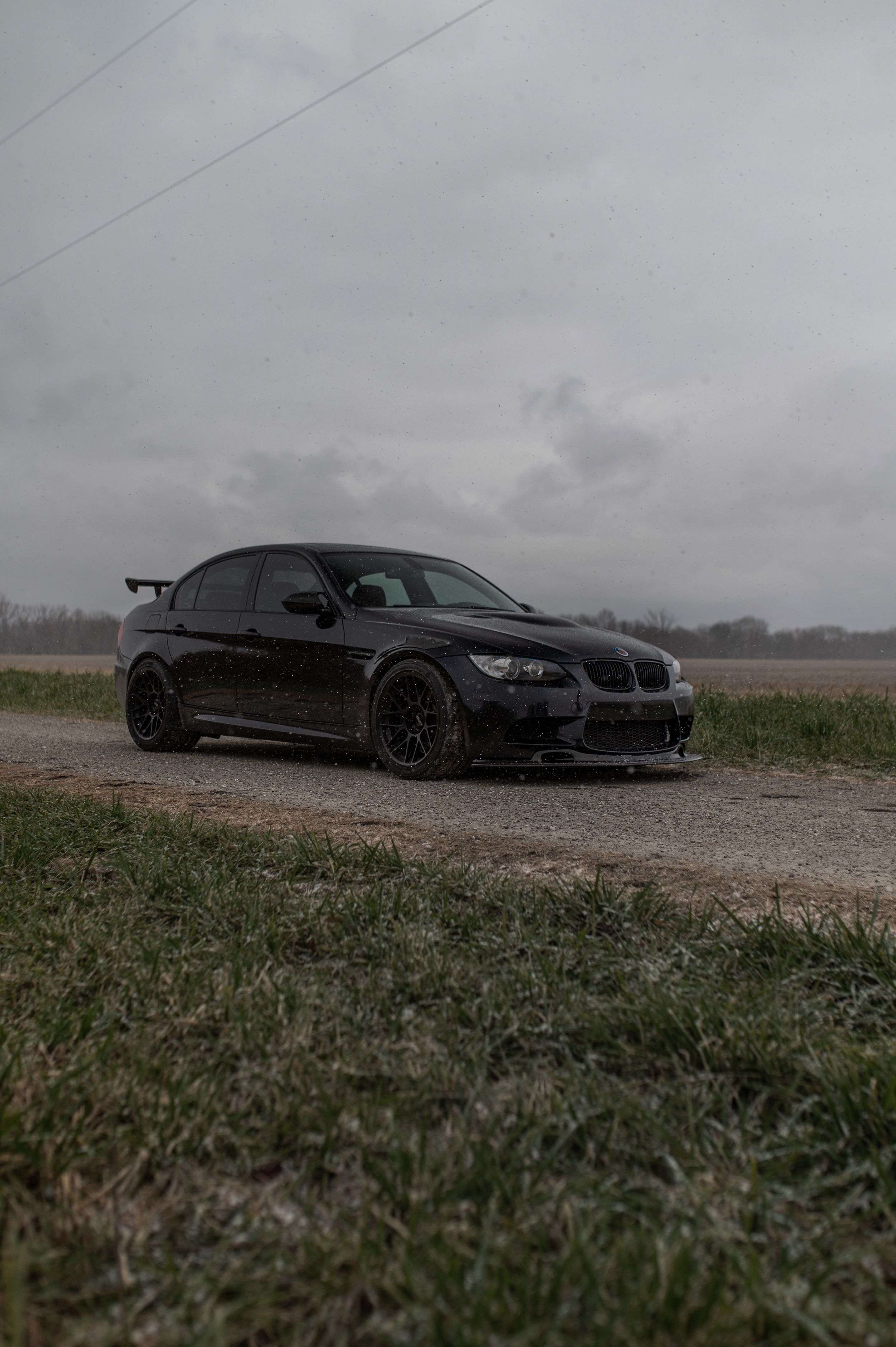 Black BMW E90 Sedan M3 with 18" ARC-8 Apex wheels in Satin Black