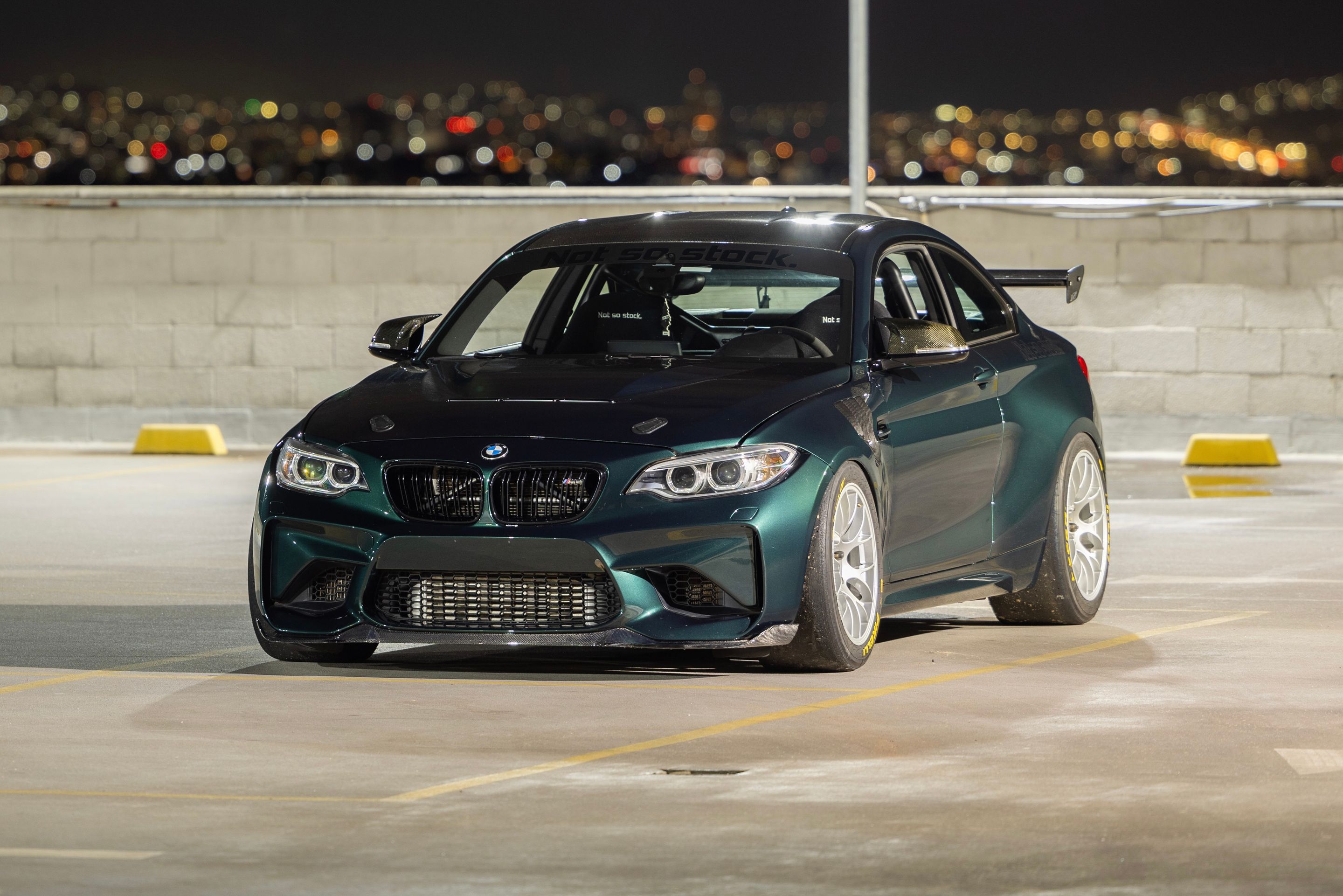 Green BMW F87 M2 with 18" EC-7 Apex wheels in Race Silver