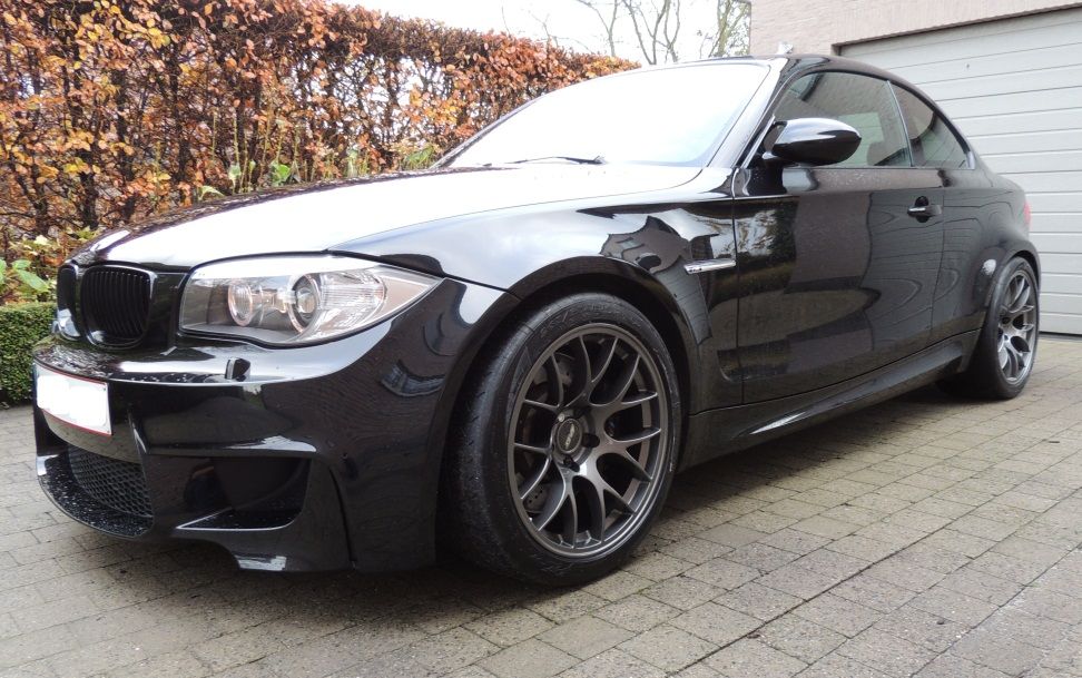 Black BMW E82 1M with 18" EC-7 Apex wheels in Anthracite