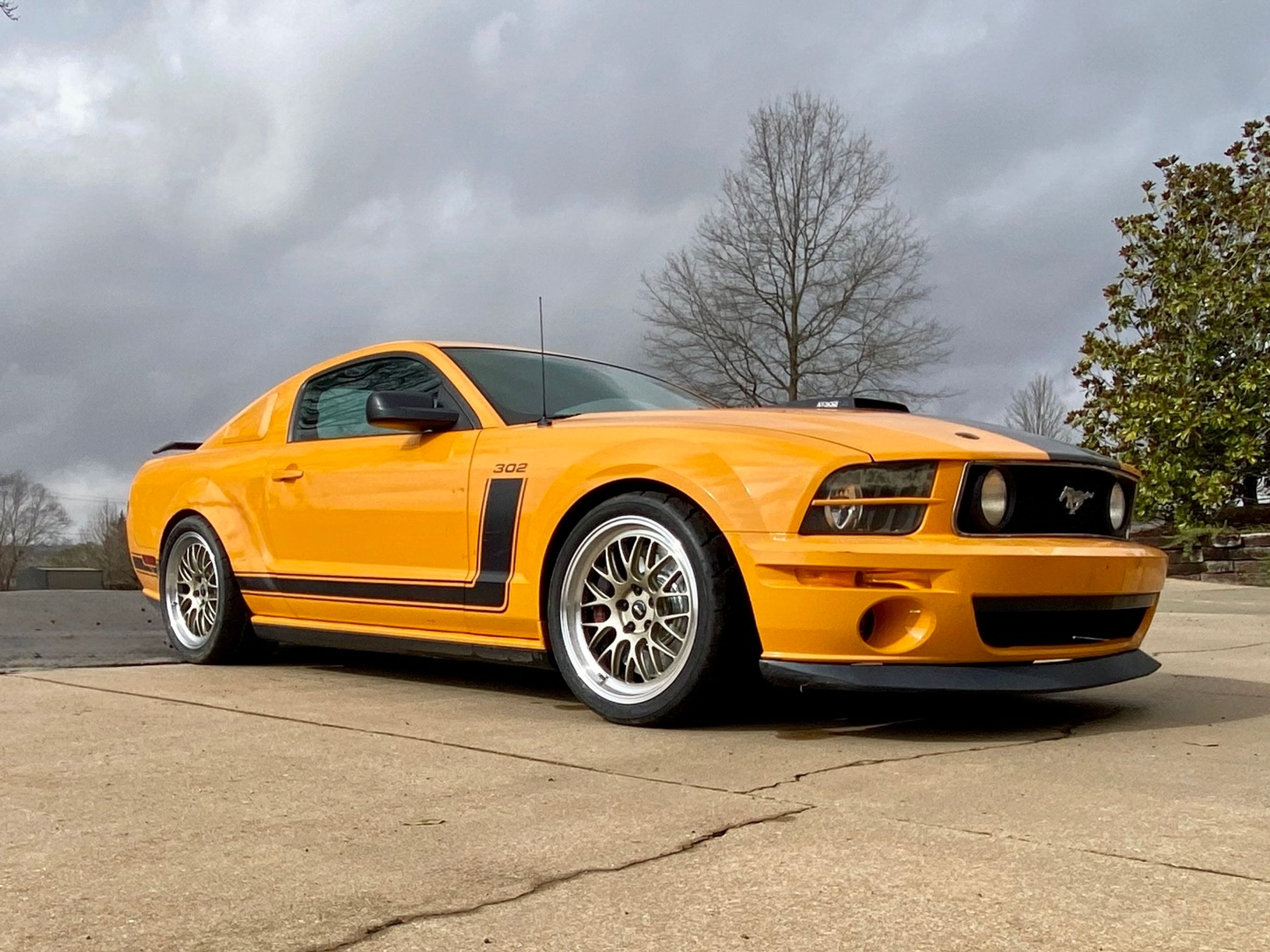 Yellow Ford S197 Mustang GT with 19" ML-10RT Apex wheels in Machined Lip Gloss Motorsport Gold