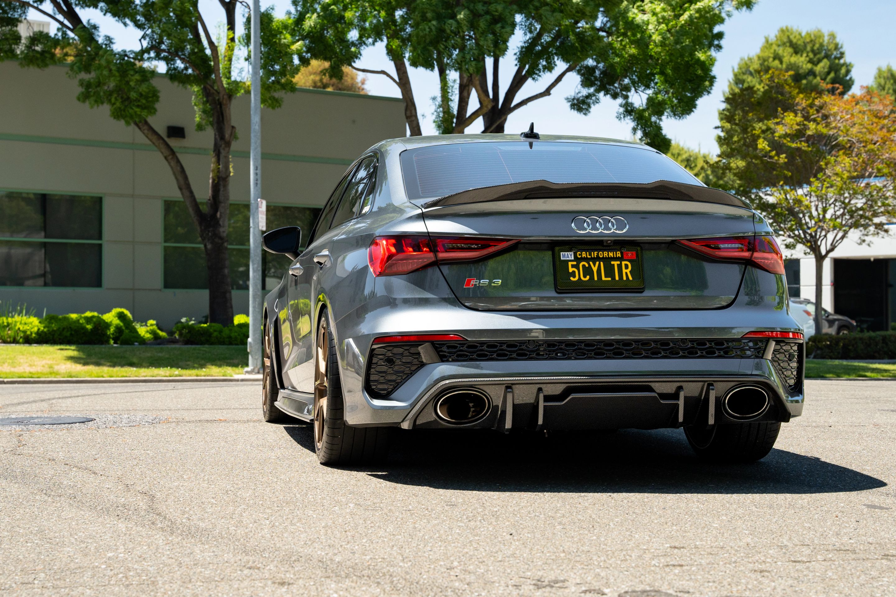 Grey Audi 8Y RS 3 with 18" VS-5 Apex wheels in Satin Bronze