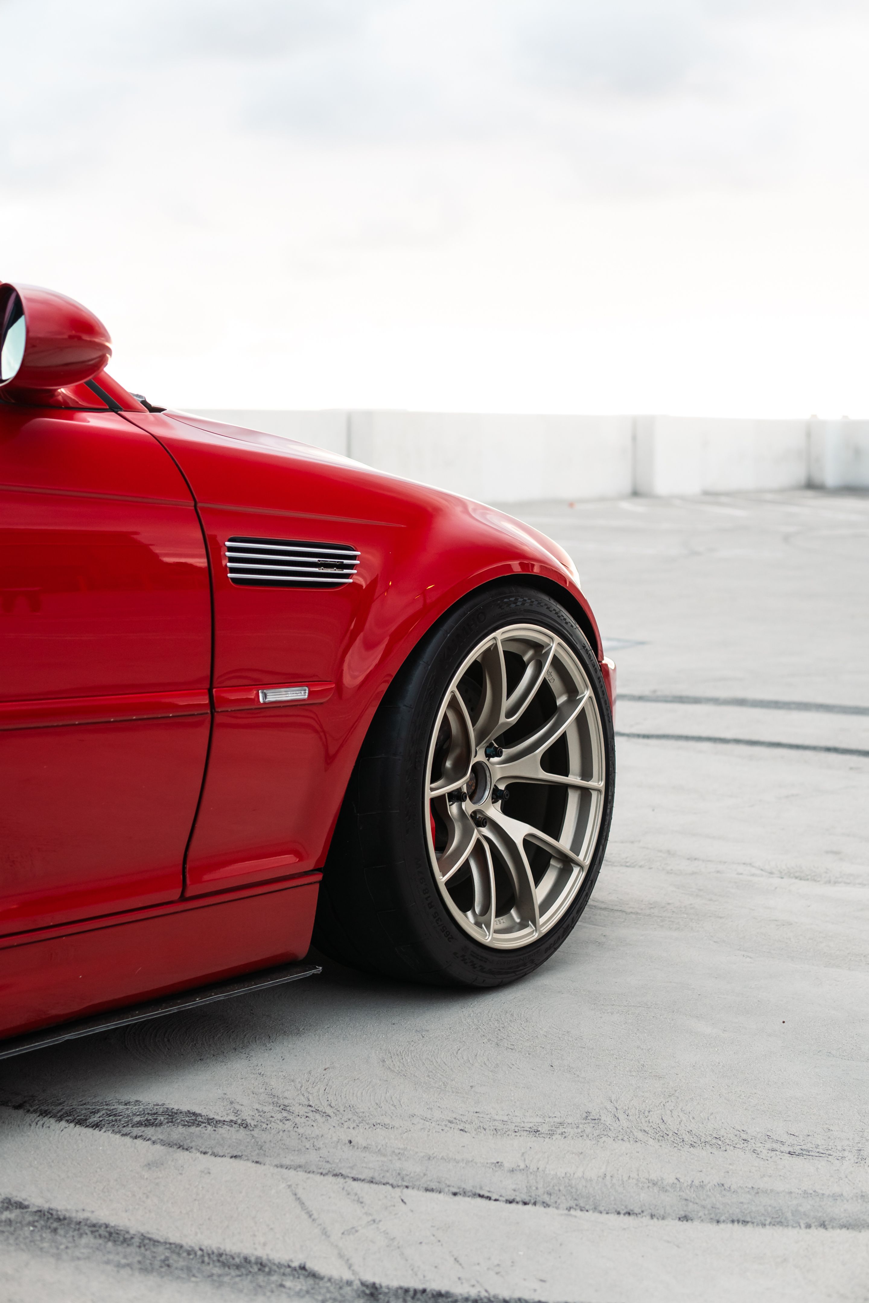 Red BMW E46 M3 with 18" VS-5RS Apex wheels in Motorsport Gold