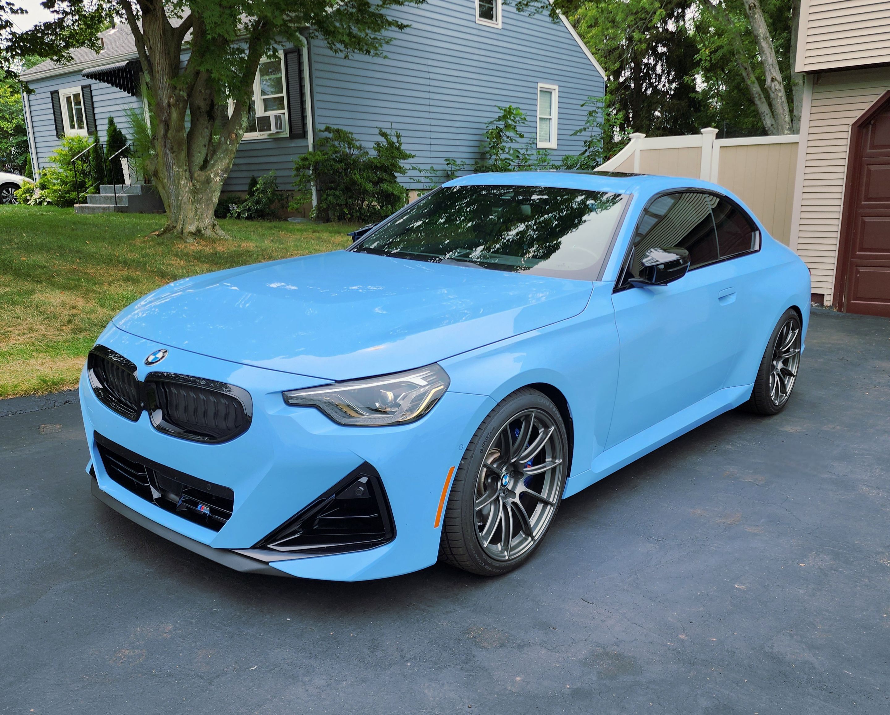 Blue BMW G42 2 Series with 19" SM-10RS Apex wheels in Anthracite