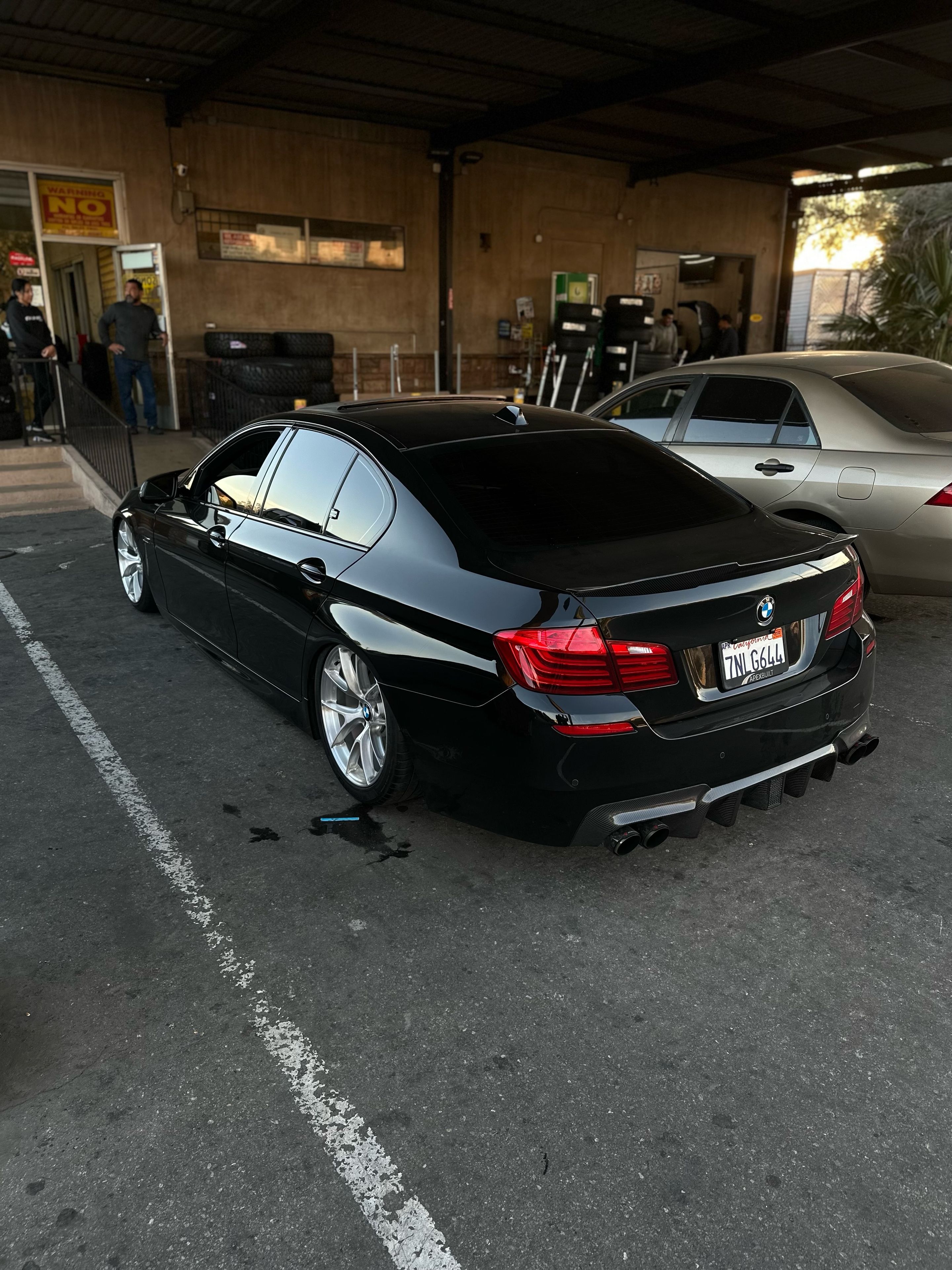 Black BMW F10 Sedan 5 Series with 19" VS-5RS Apex wheels in Brushed Clear