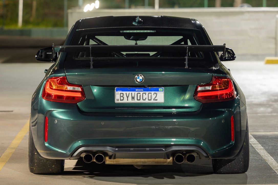 Green BMW F87 M2 with 18" EC-7 Apex wheels in Race Silver