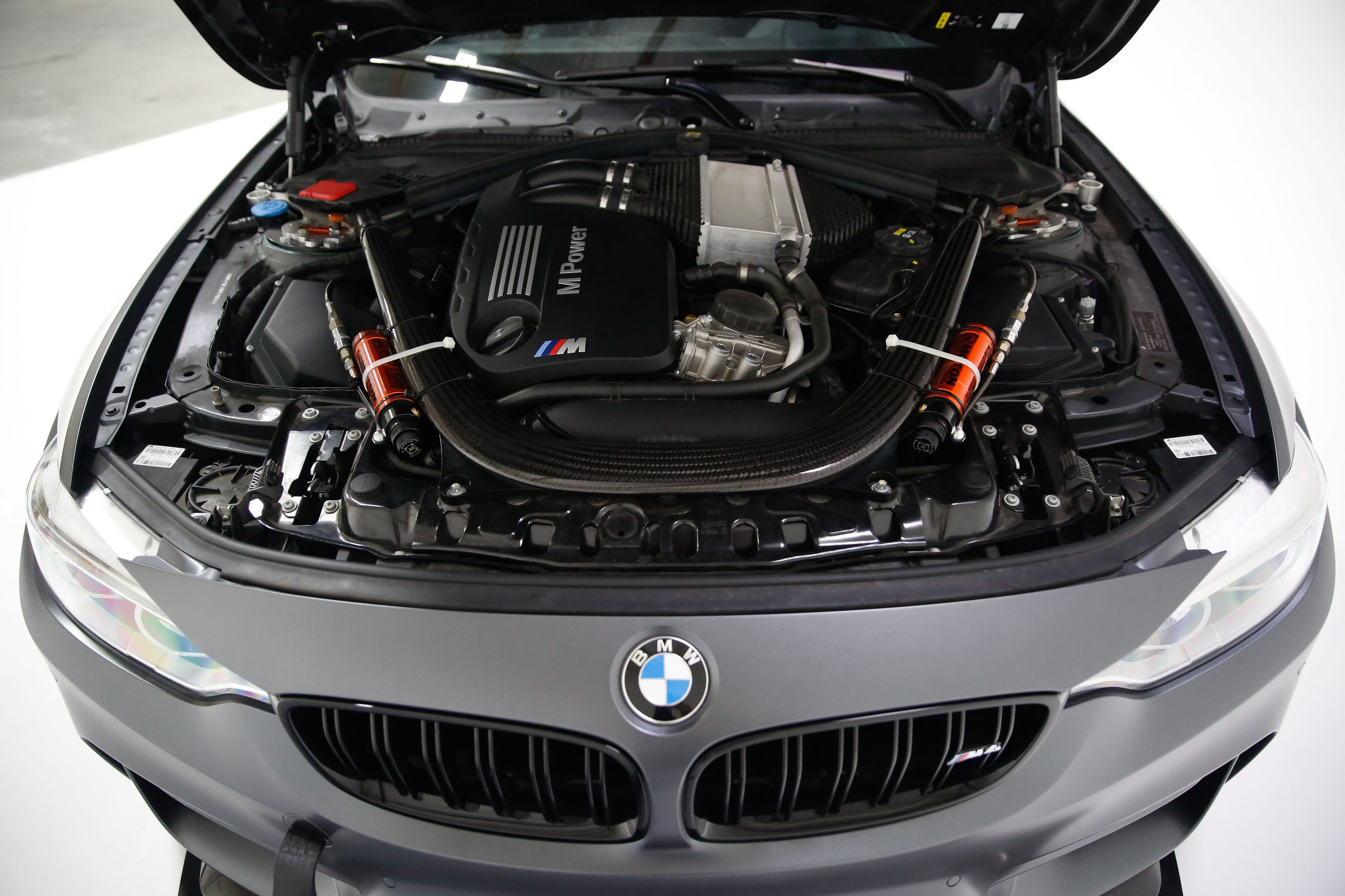 Grey BMW F82 Coupe M4 with 18" FL-5 Apex wheels in Race Silver