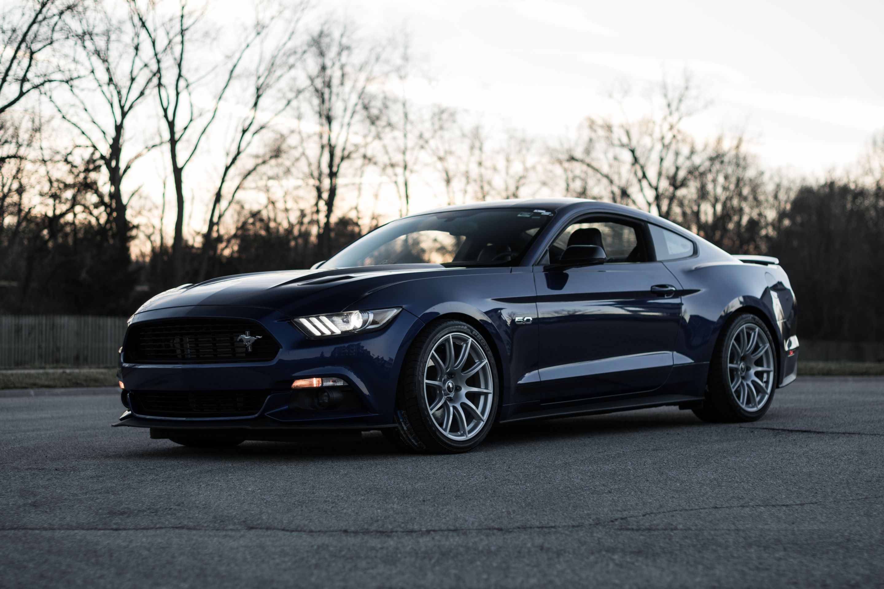 Blue Ford S550 Mustang GT with 19" SM-10 Apex wheels in Race Silver