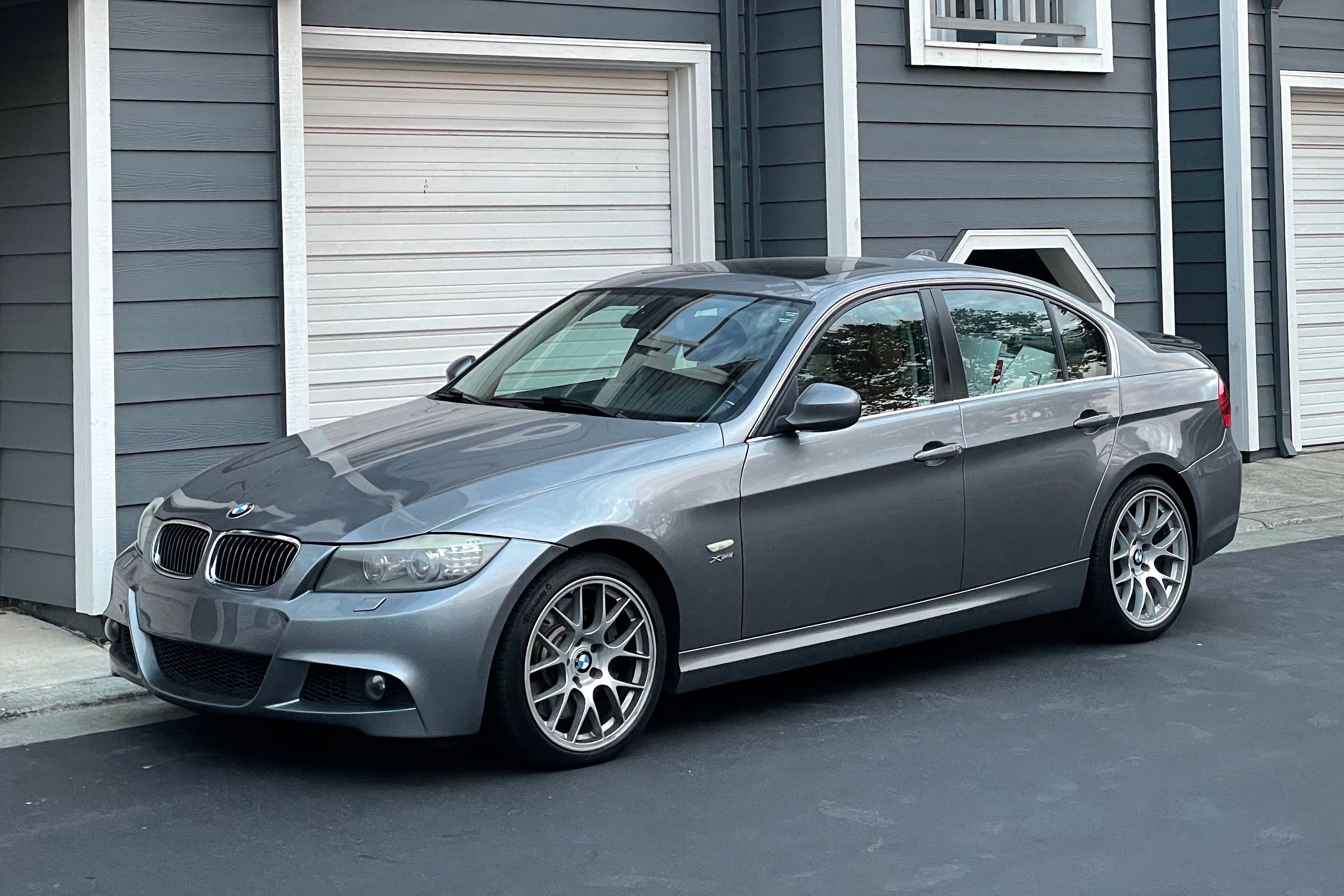Grey BMW E90 LCI Sedan 3 Series with 18" EC-7 Apex wheels in Race Silver