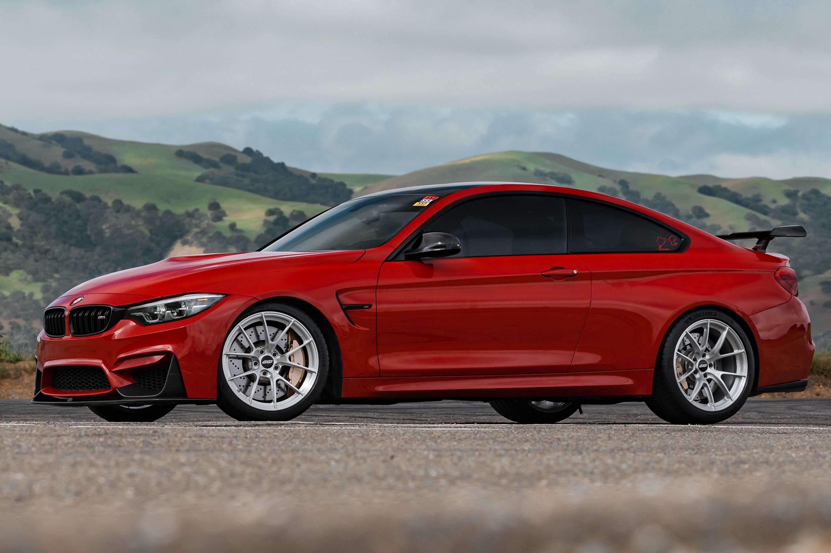 Red BMW F82 Coupe M4 with 19" VS-5RS Apex wheels in Brushed Clear