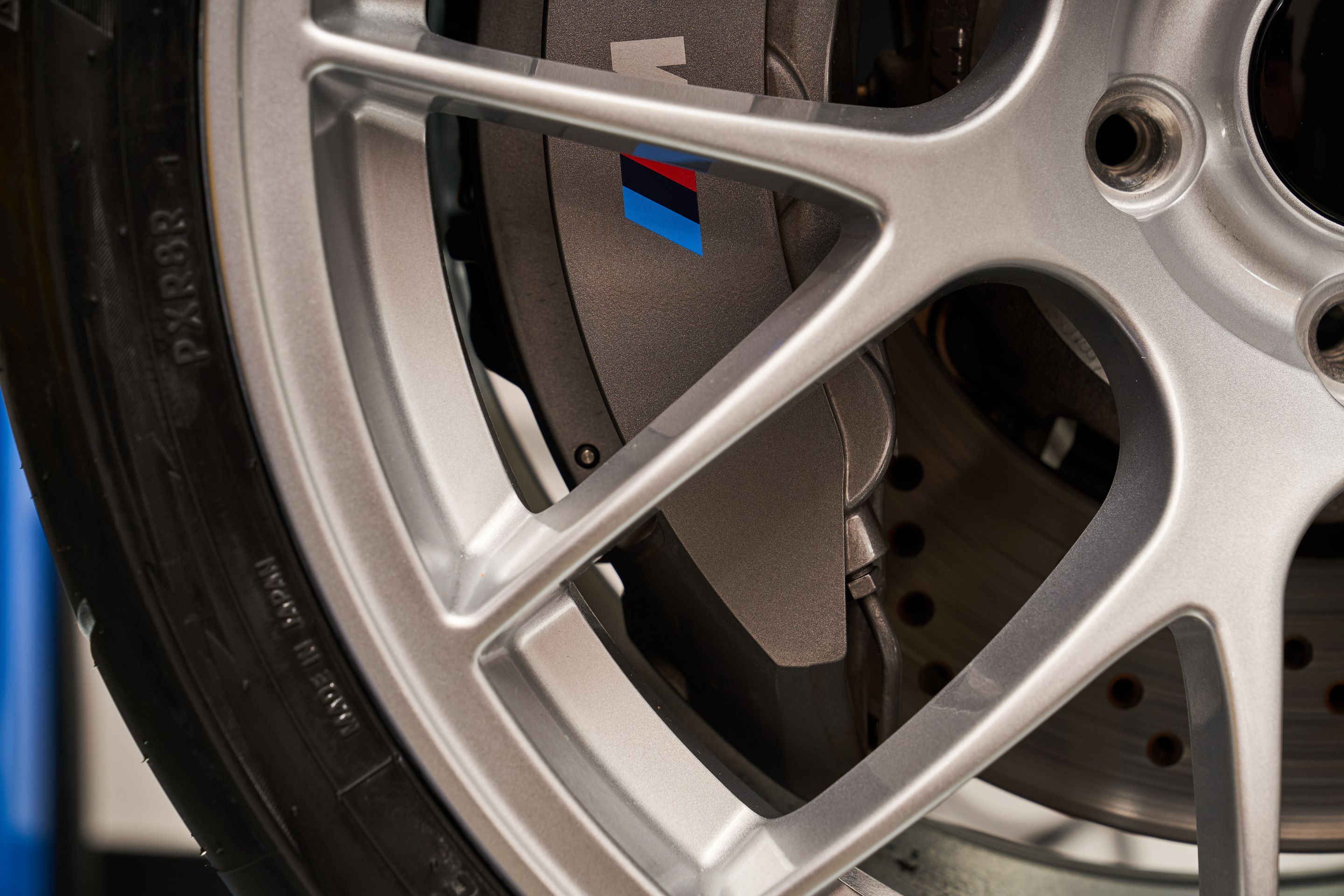 Blue BMW F87 M2 with 19" EC-7 Apex wheels in Race Silver