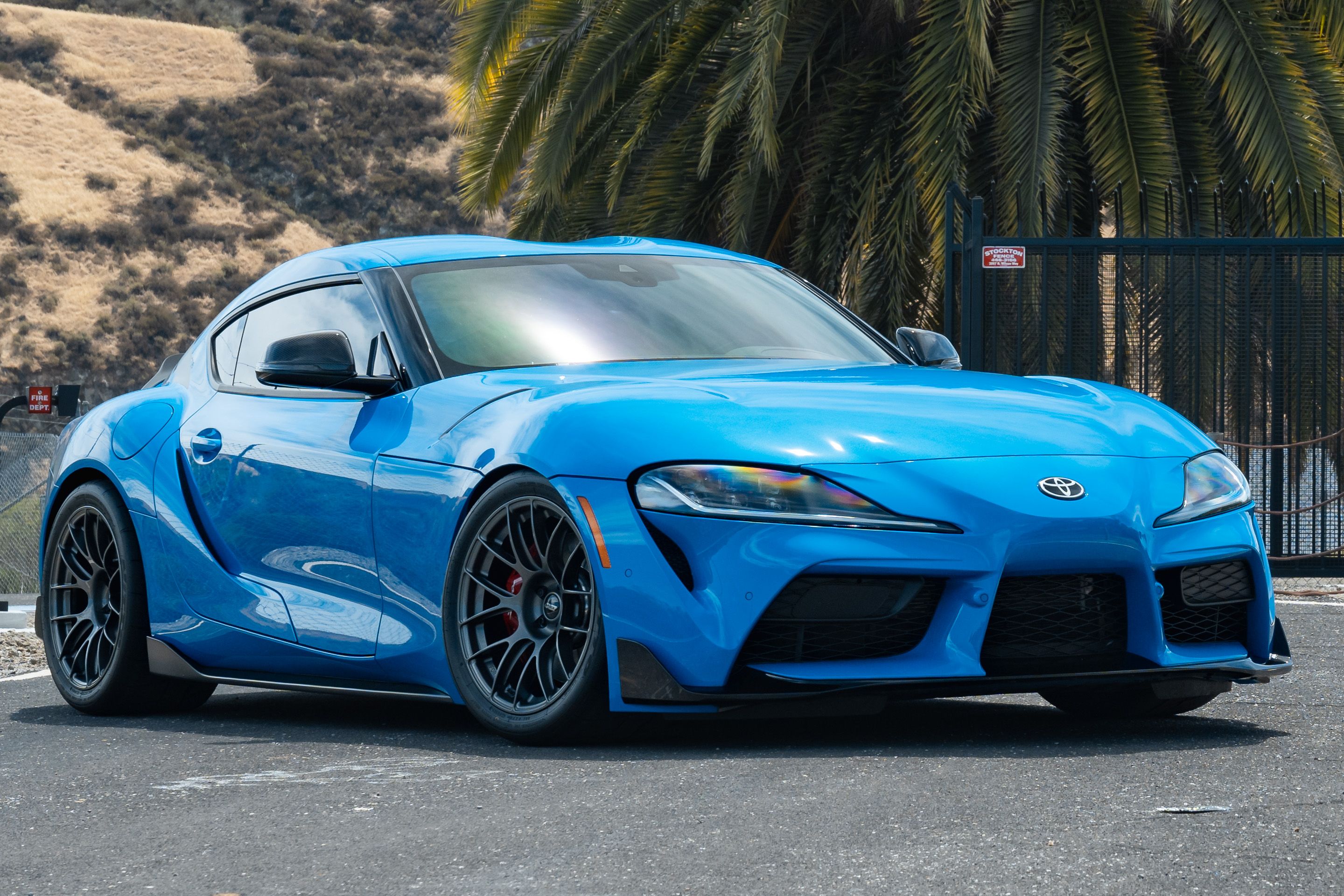 Blue Toyota GR Supra with 18" EC-7RS Apex wheels in Anthracite