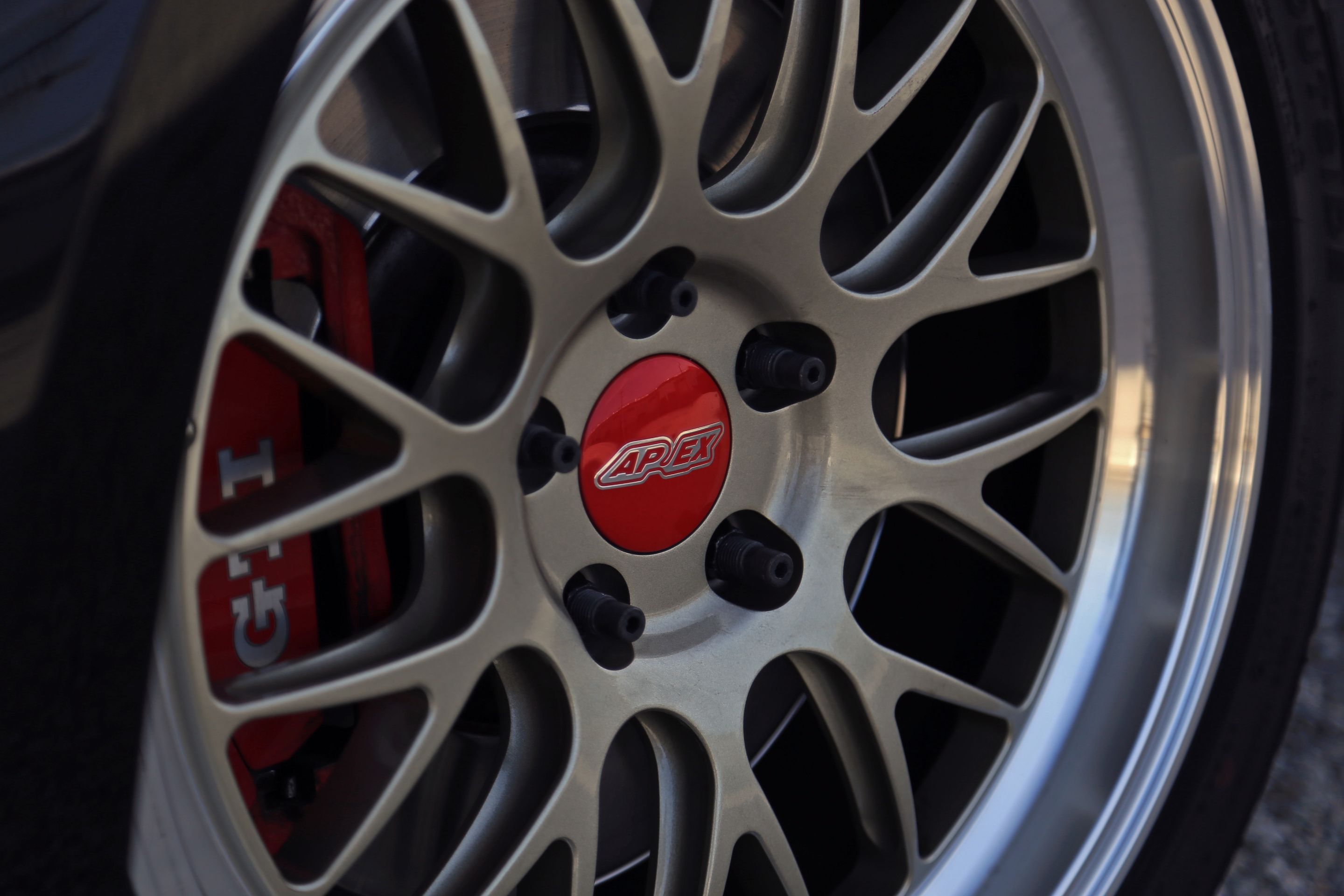 Black VW MK7 GTI with 18" ML-10RT Apex wheels in Machined Lip Gloss Motorsport Gold