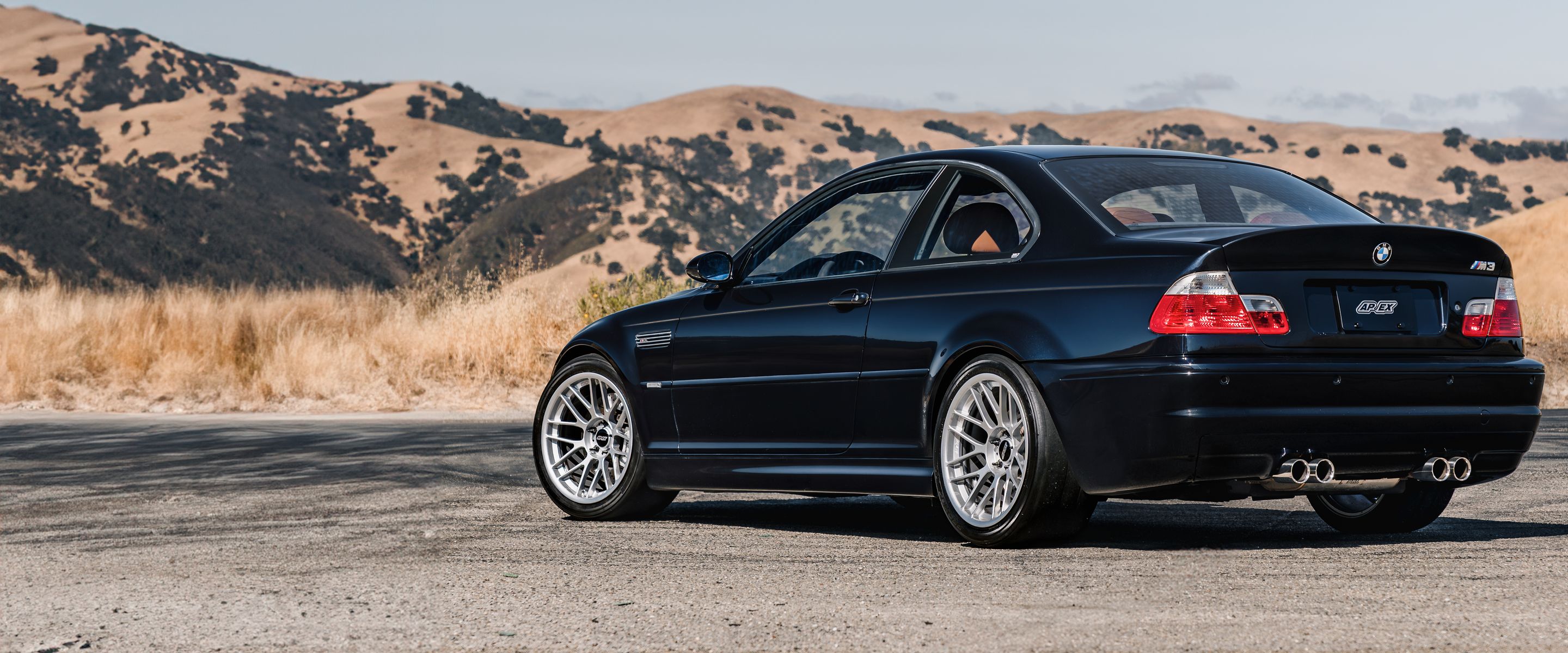 Black BMW E46 M3 with 18" ARC-8RT Apex wheels in Race Silver