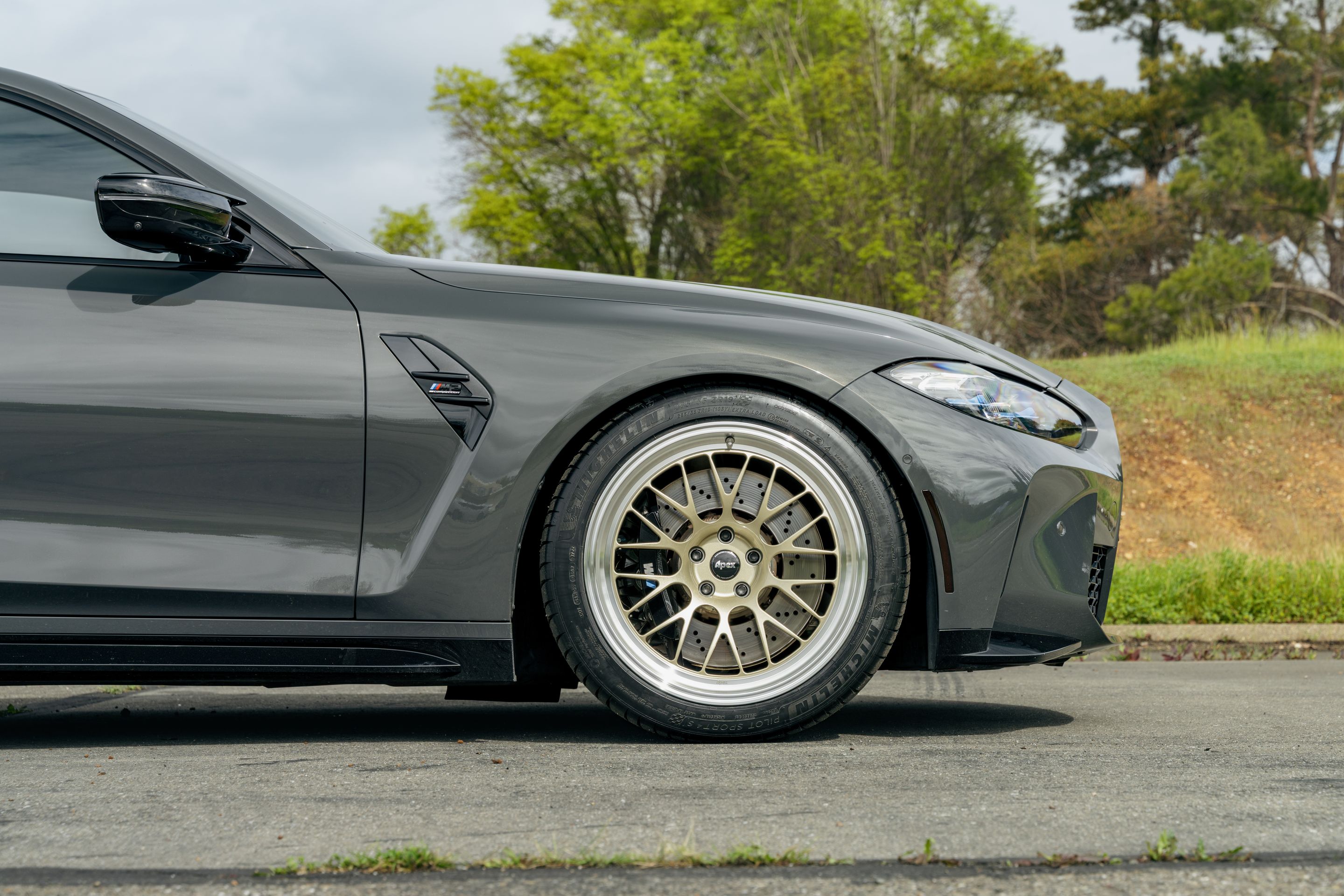 Grey BMW G80 M3 with 19"/20" ML-10RT Apex wheels in Machined Lip Gloss Motorsport Gold
