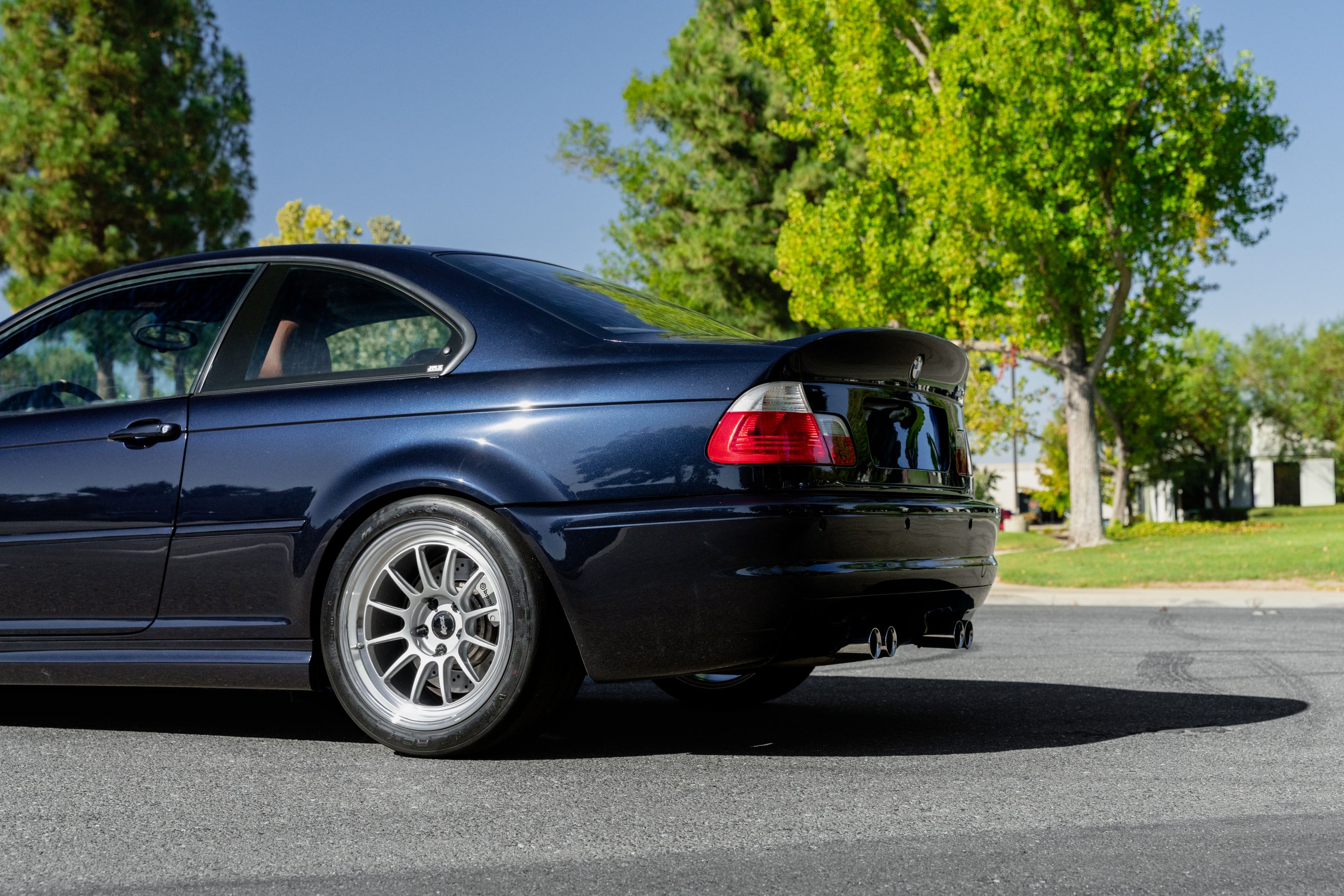 Black BMW E46 M3 with 18" SL-12 Apex wheels in Machined Lip Race Silver