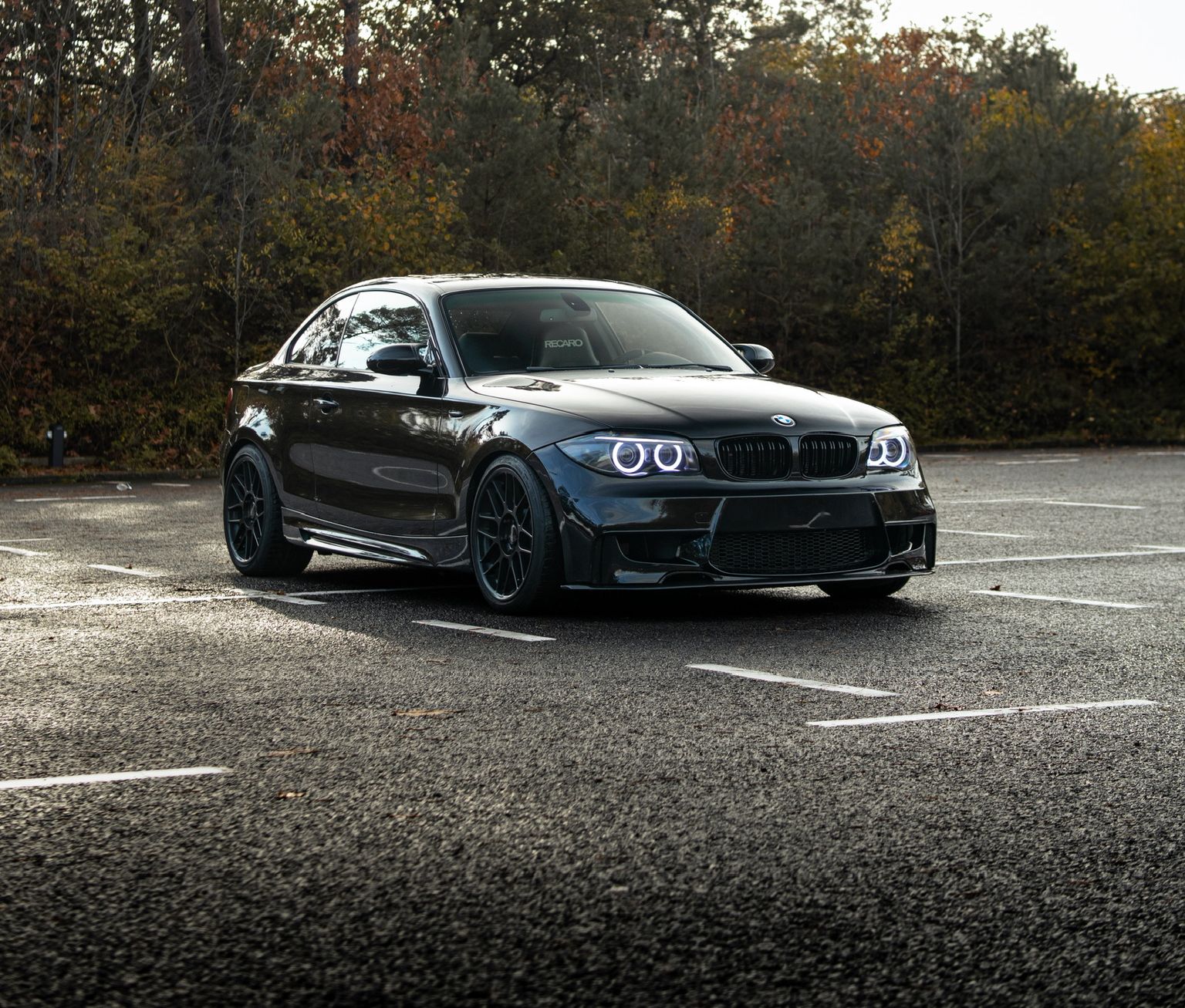Black BMW E82 Coupe 1 Series with 18" ARC-8 Apex wheels in Satin Black