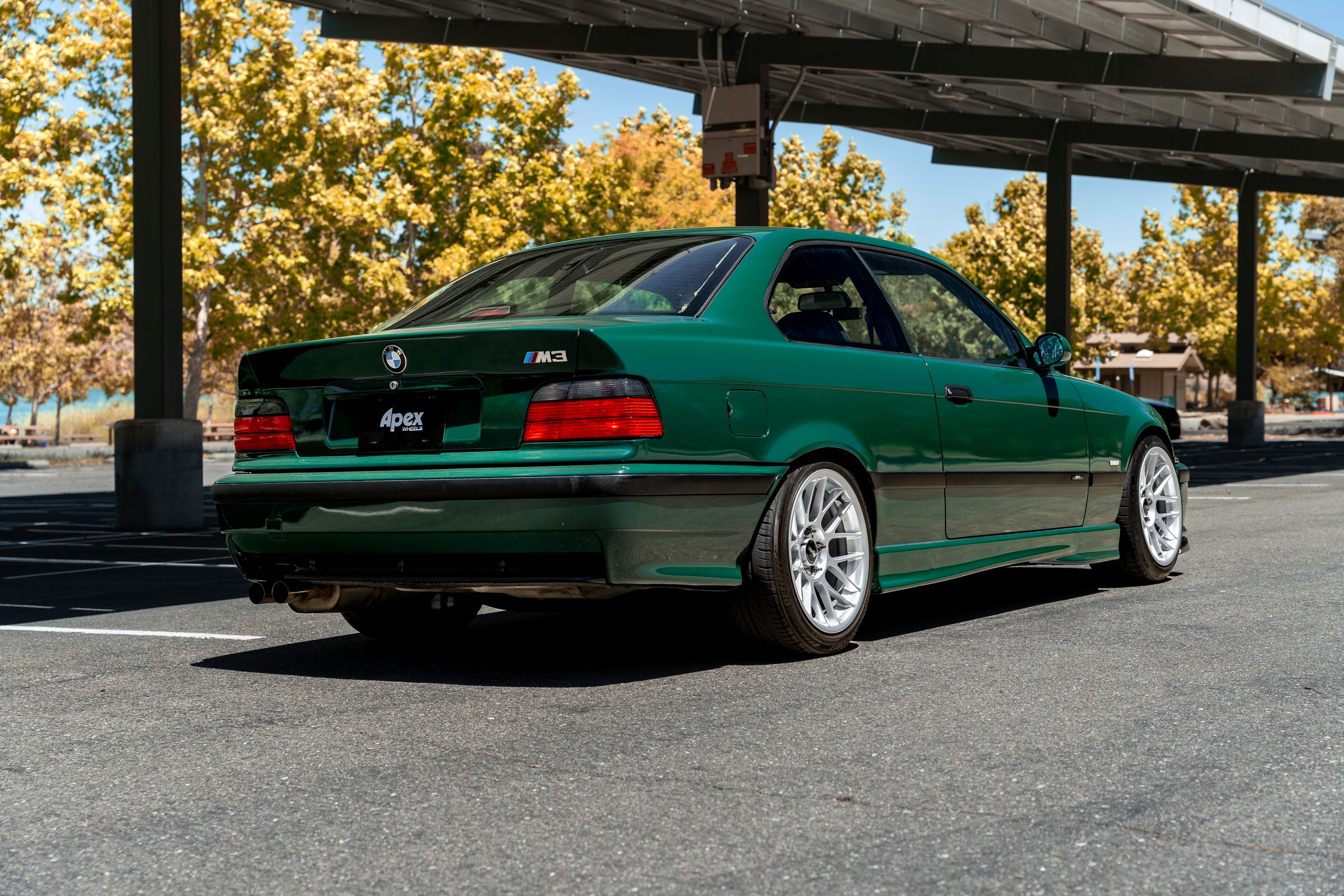 Green BMW E36 M3 with 17" ARC-8 Apex wheels in Race Silver
