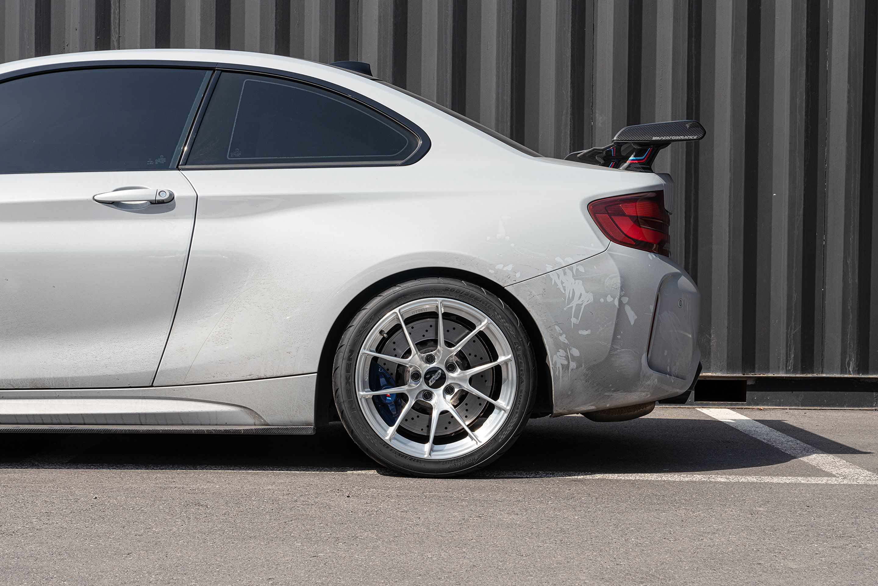 Grey BMW F87 M2 with 18" VS-5RS Apex wheels in Brushed Clear