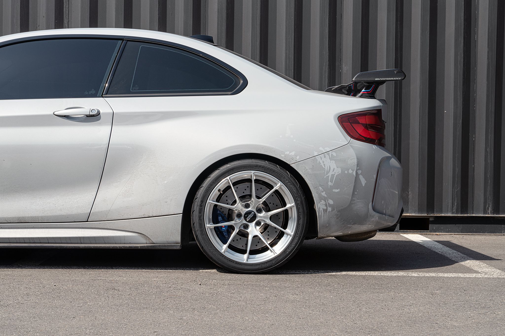 Grey BMW F87 M2 with 18" VS-5RS Apex wheels in Brushed Clear