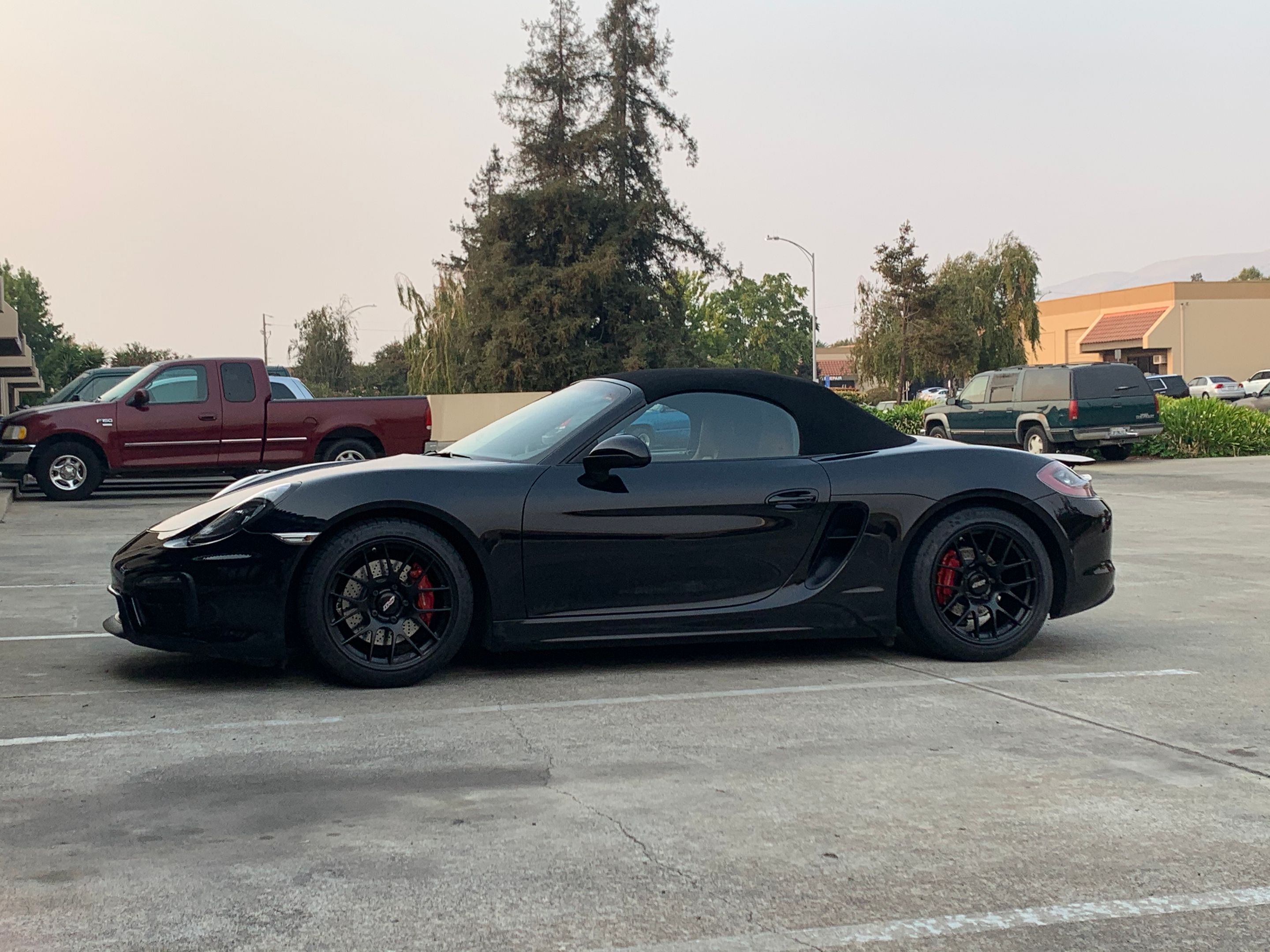 Black Porsche 981 Boxster GTS with 18" EC-7R Apex wheels in Satin Black