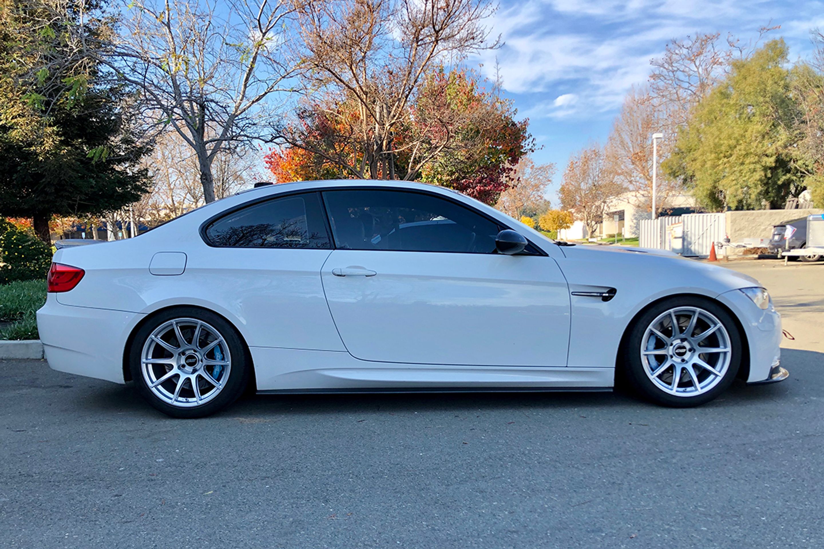 White BMW E92 Coupe M3 with 18" SM-10 Apex wheels in Race Silver