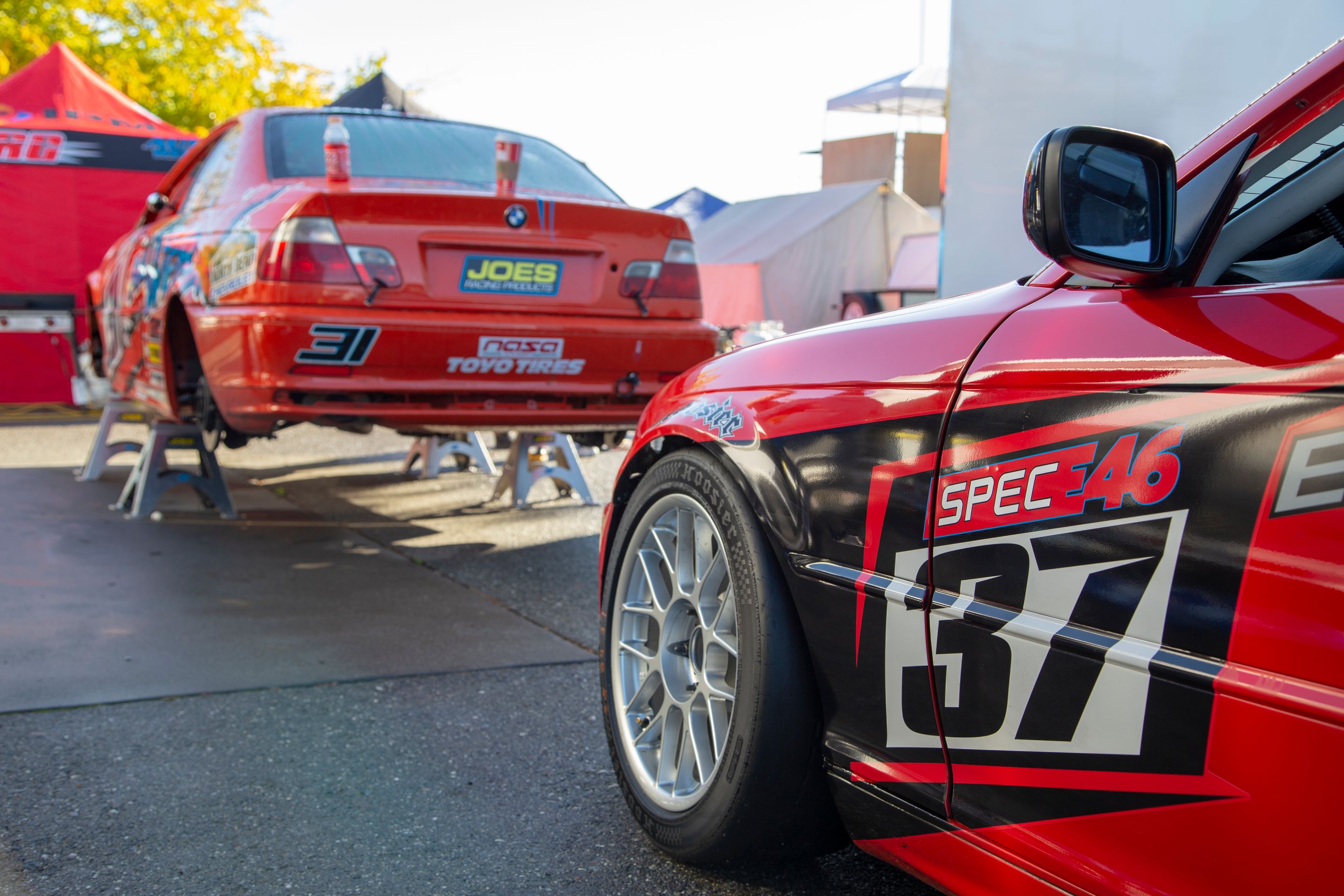 Red BMW Spec E46 with 17" ARC-8 Apex wheels in Race Silver