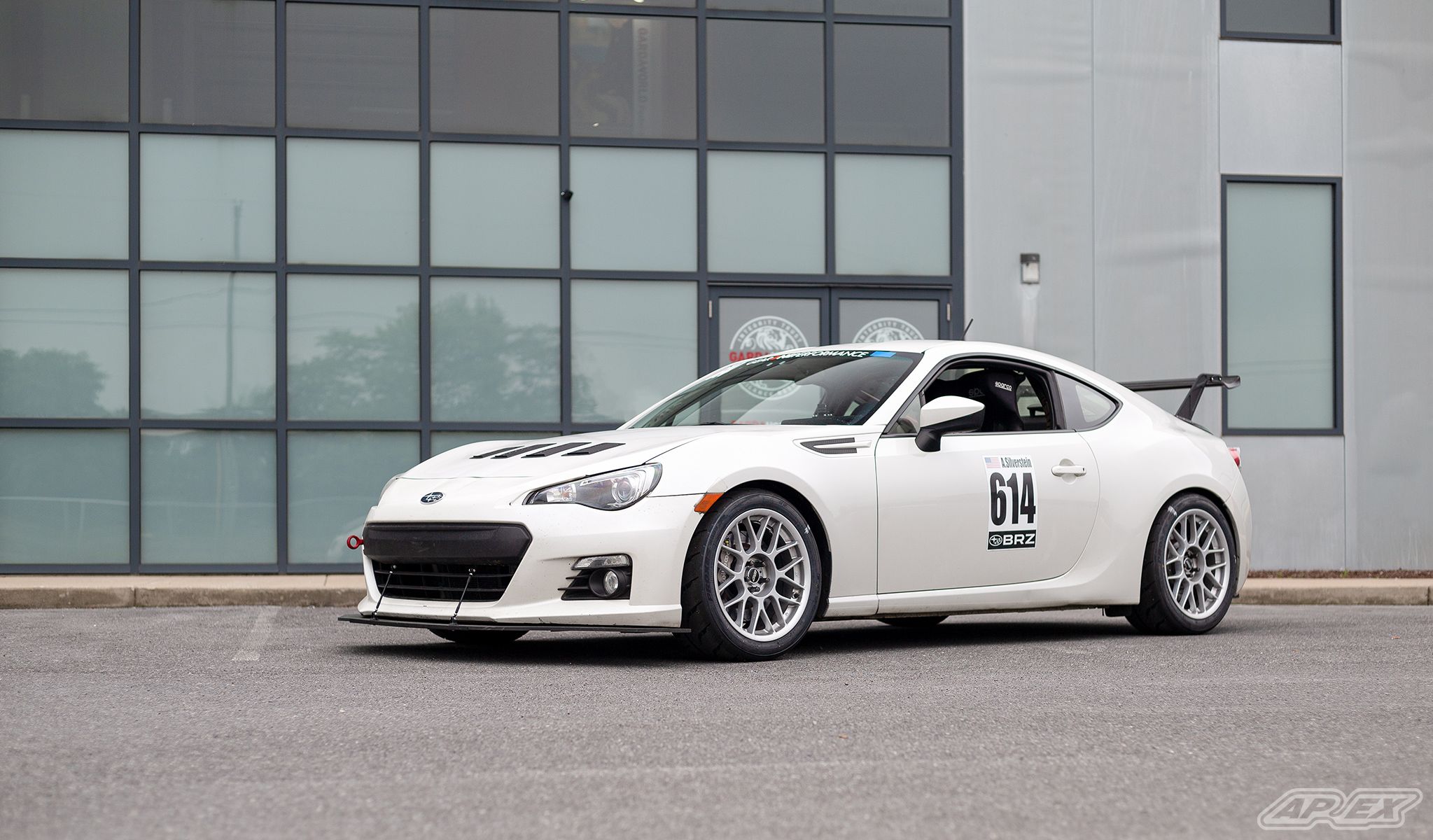White Subaru ZC6 / Gen 1 BRZ with 17" ARC-8 Apex wheels in Race Silver