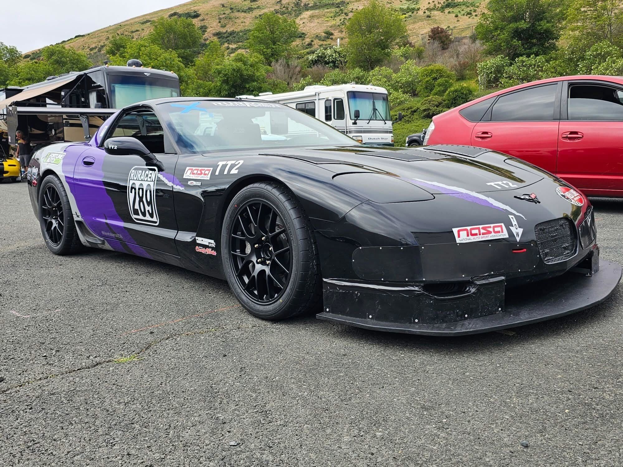 Black Chevrolet C5 Corvette Z06 with 18" EC-7 Apex wheels in Satin Black